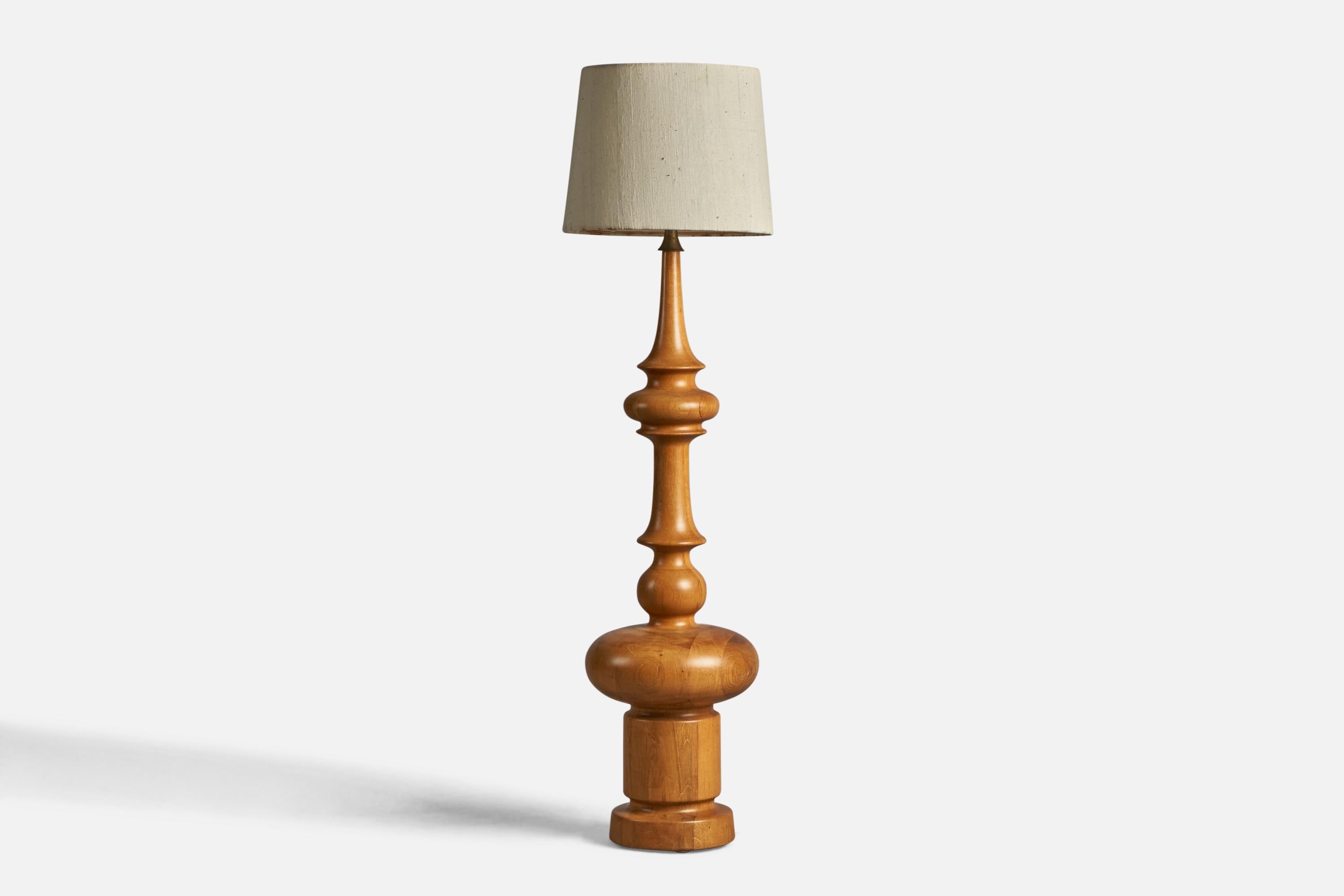 An oak, brass and woven beige fabric floor lamp designed and produced in Denmark, c. 1950s.

Overall Dimensions (inches): 55.5” H x 15” Diameter
Bulb Specifications: E-26 Bulb
Number of Sockets: 1