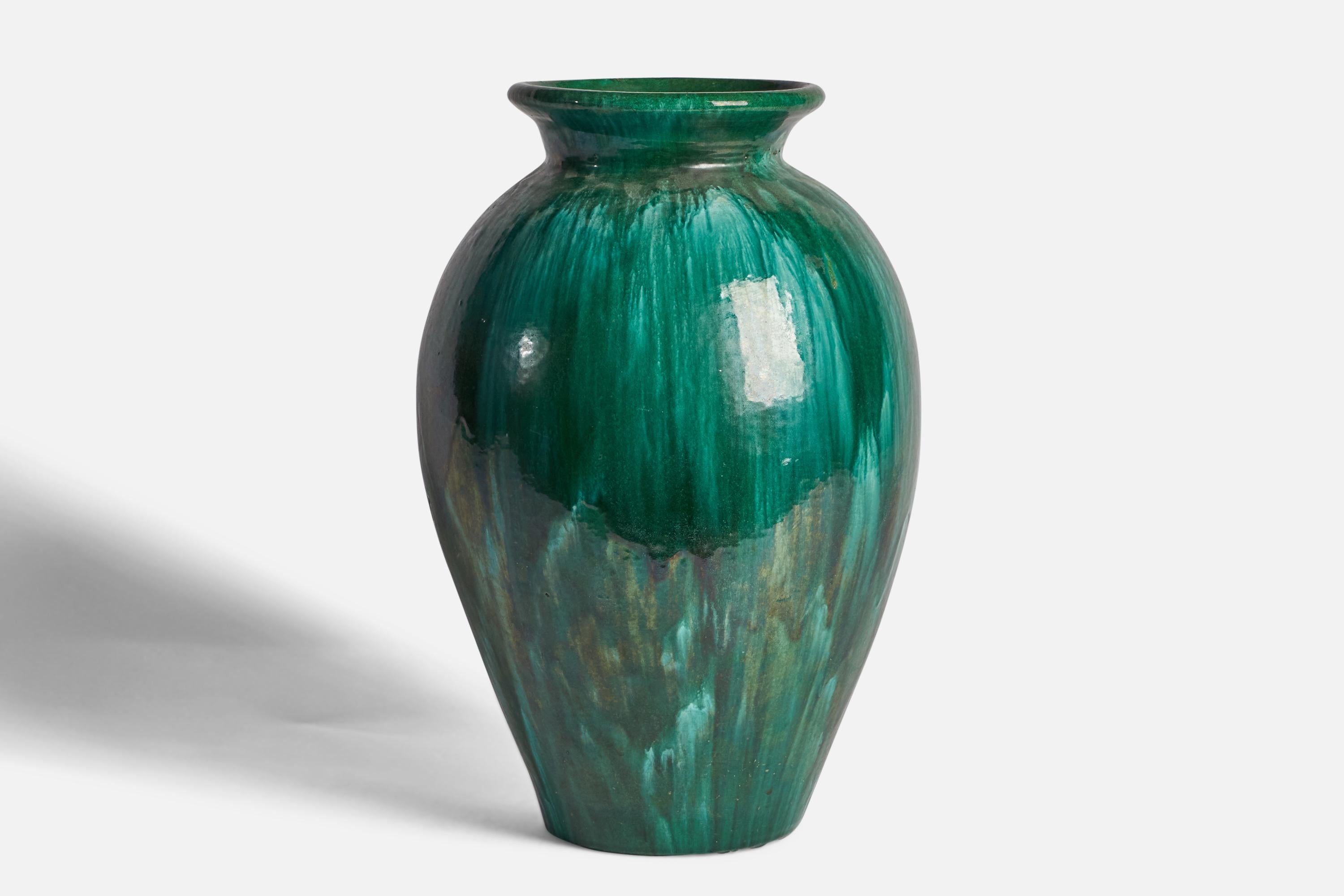 A green-glazed earthenware floor vase designed and produced in Denmark, 1930s.