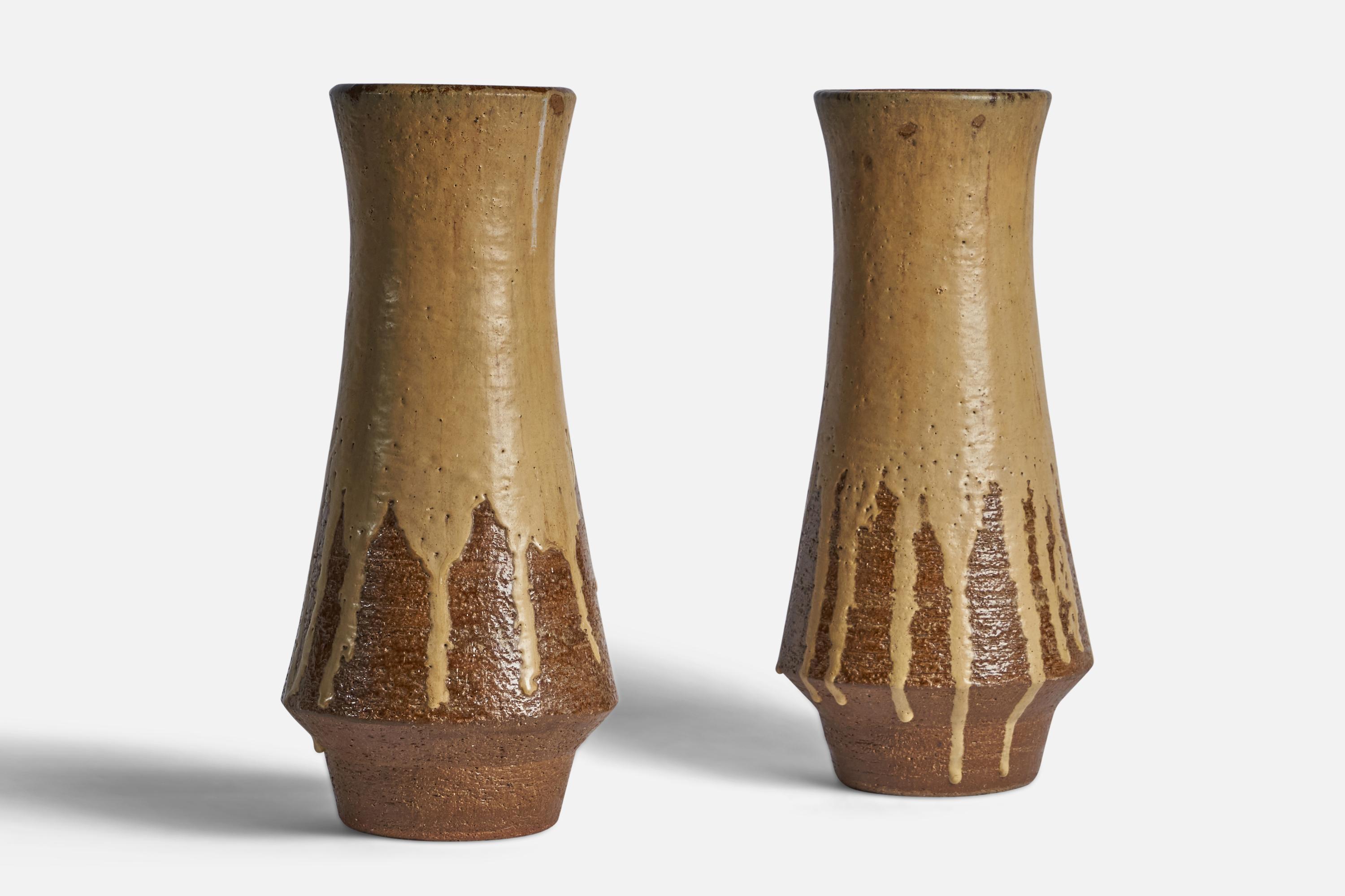 A pair of beige and brown-glazed stoneware vases designed and produced in Denmark, c. 1940s.