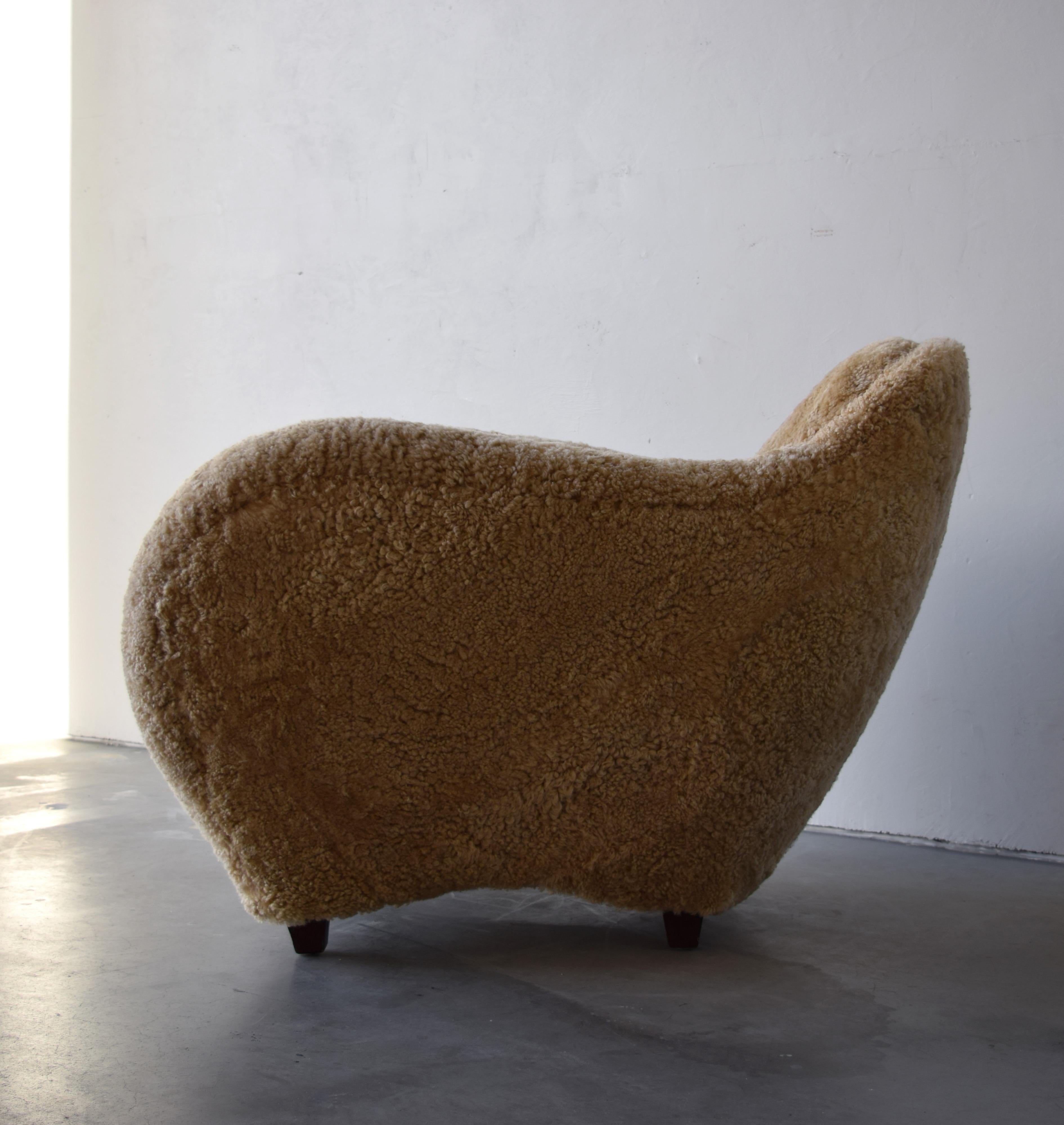 Mid-20th Century Danish Designer, Large Organic Lounge Chair, Sheepskin, Wood, Denmark, 1940s