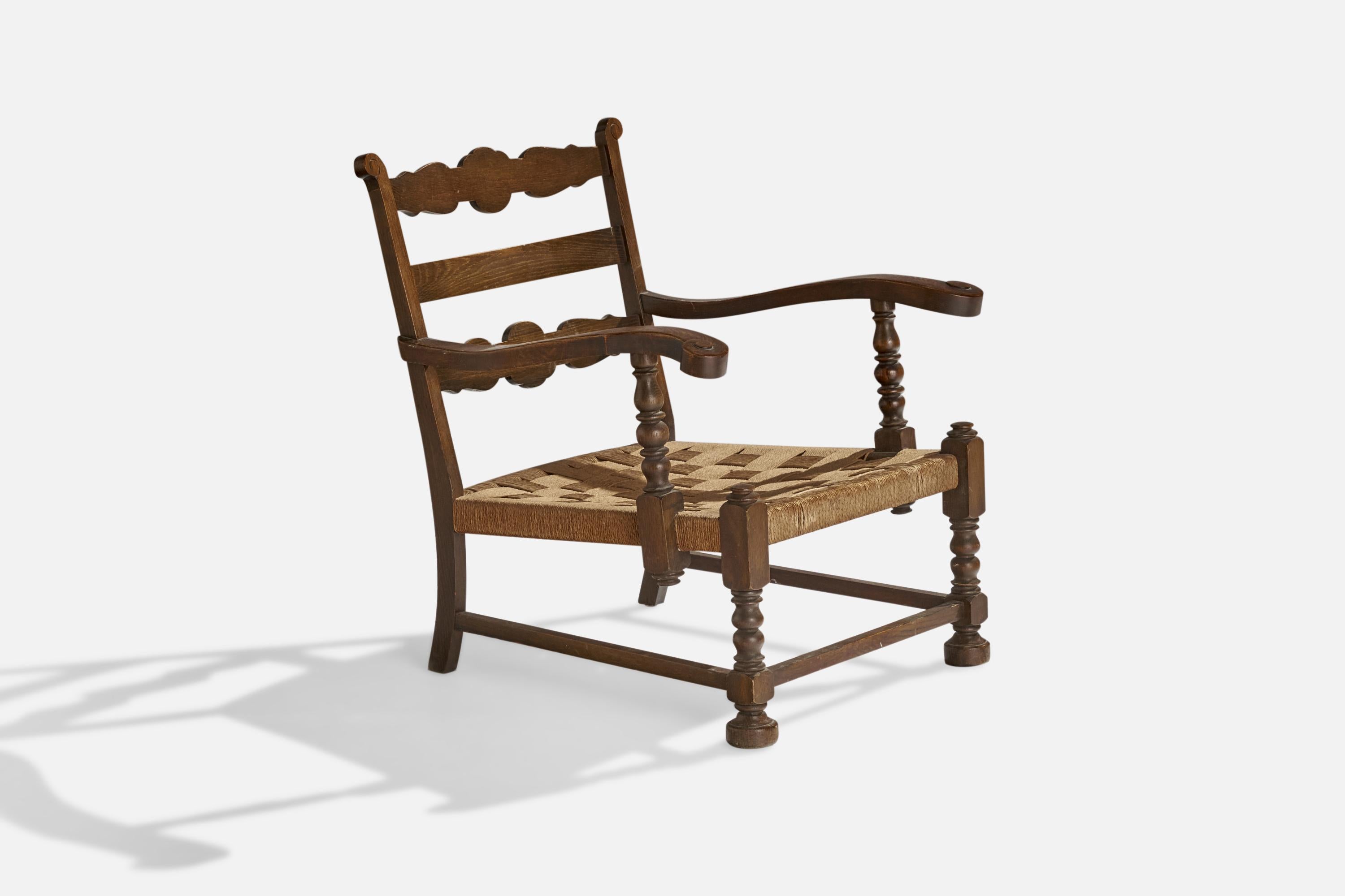 Chaises longues en chêne teinté foncé et en jonc, conçues et produites au Danemark, c.C. 1940.

hauteur de l'assise : 13