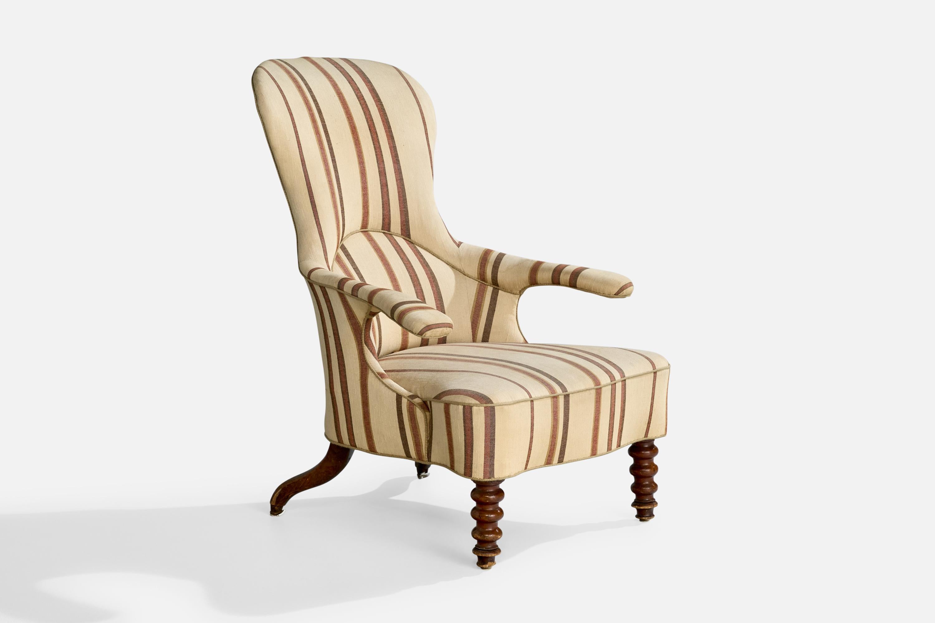 A fabric and dark-stained wood lounge chair designed and produced in Denmark, c. 1900.

Vintage fabric in distressed condition, in need to reupholstery.

Dimensions: 39.75” H x 30” W x 36.5” D

Seat Height: 15”
