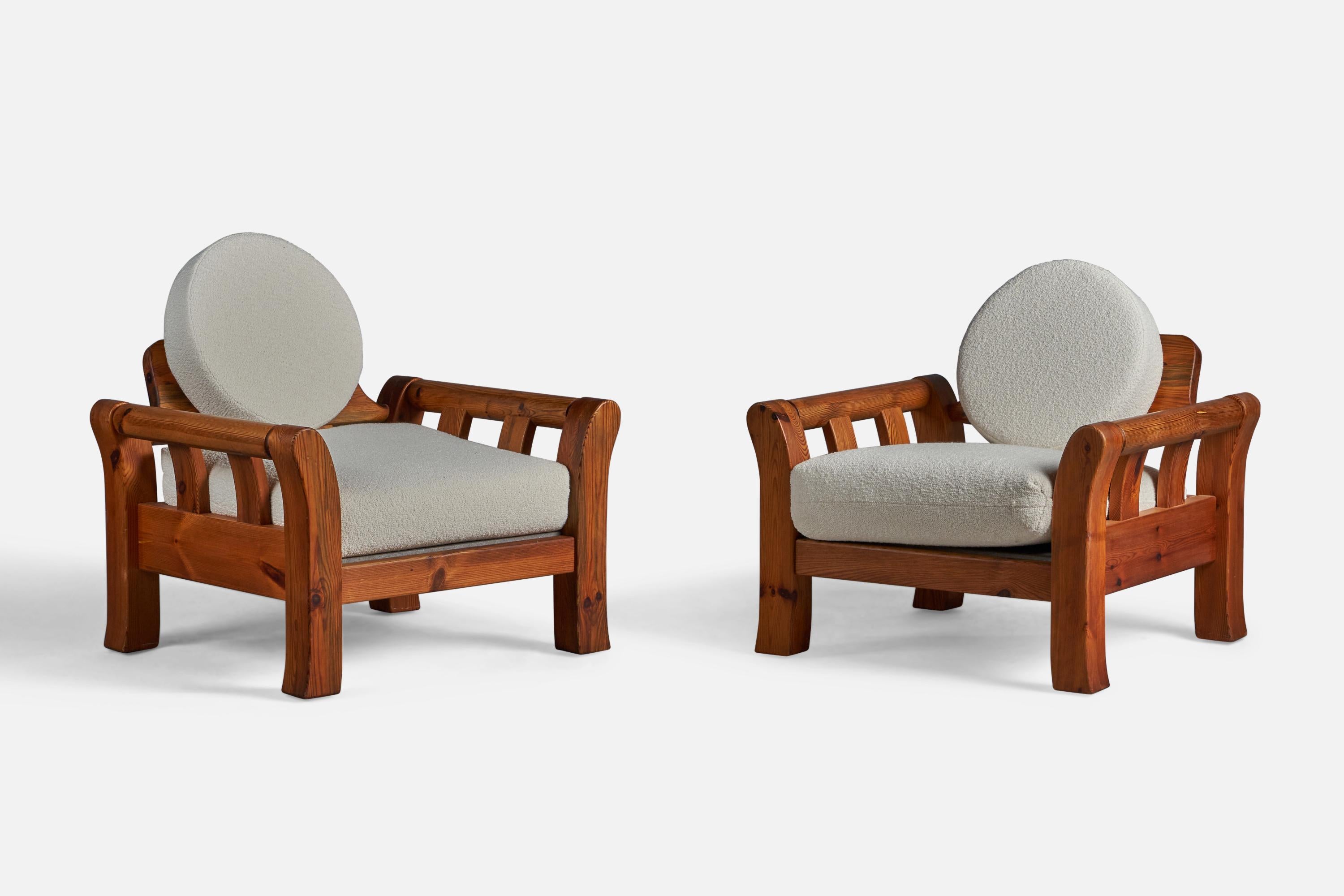 A pair of solid pine and white bouclé fabric lounge chairs, designed and produced in Denmark, 1960s.

16