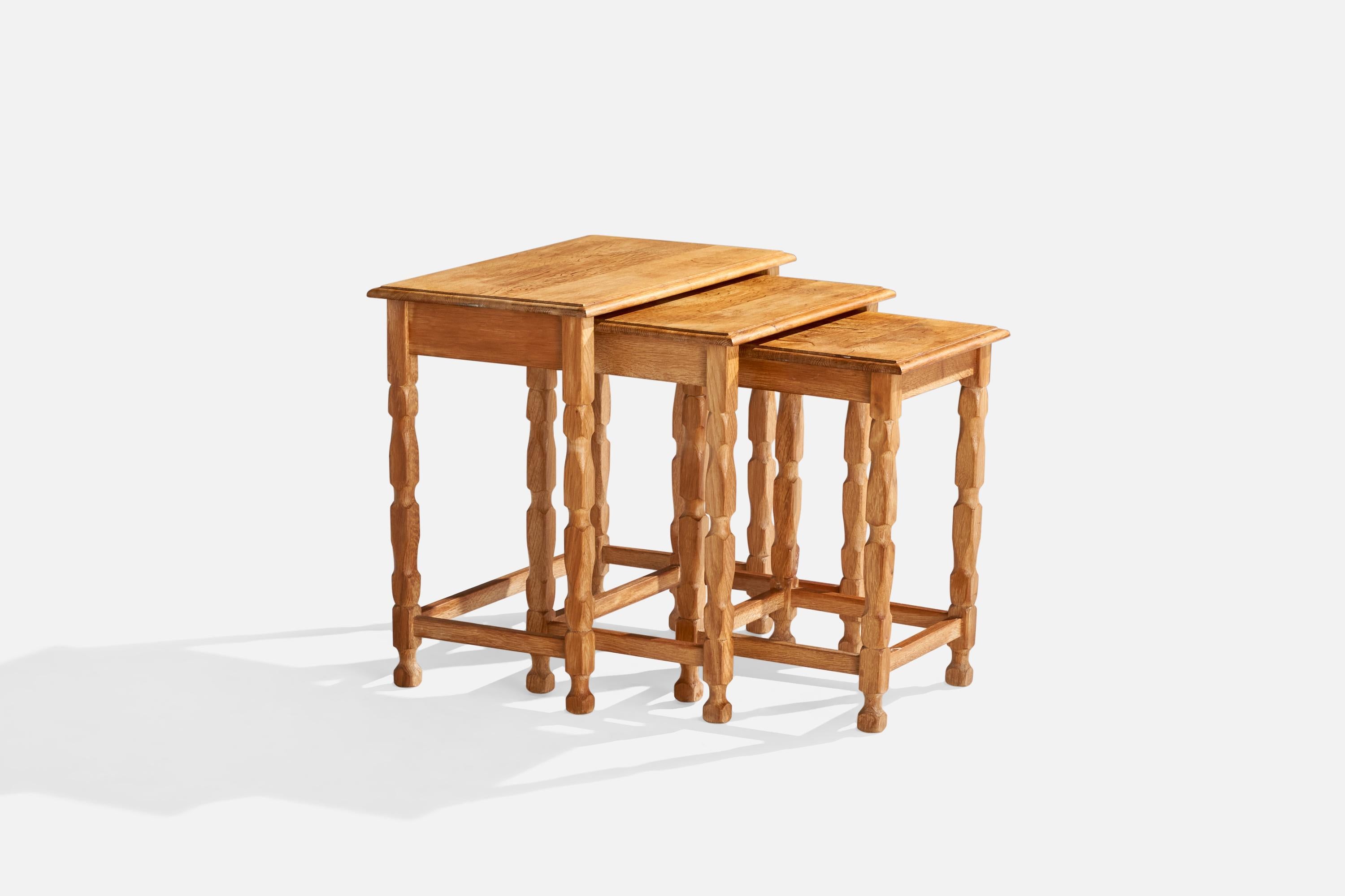 A set of 3 nesting tables designed and produced in Denmark, c. 1960s.

Dimensions of medium table: 19.25