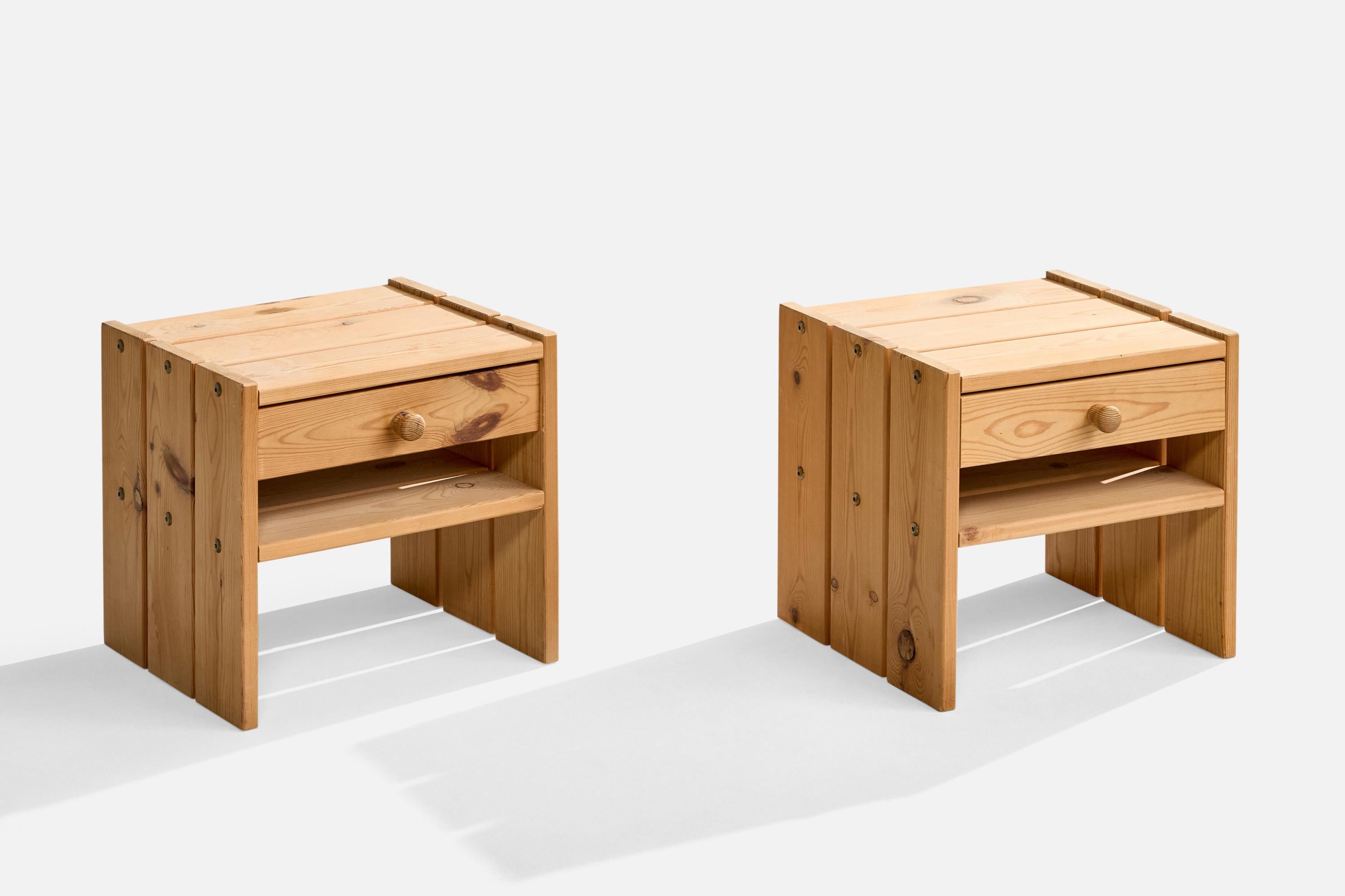 A pair of pine nightstands designed and produced in Denmark, c. 1970s.

Overall Dimensions (inches): 15” H x 15” W x 13.5” D

All items ship from High Point, North Carolina.