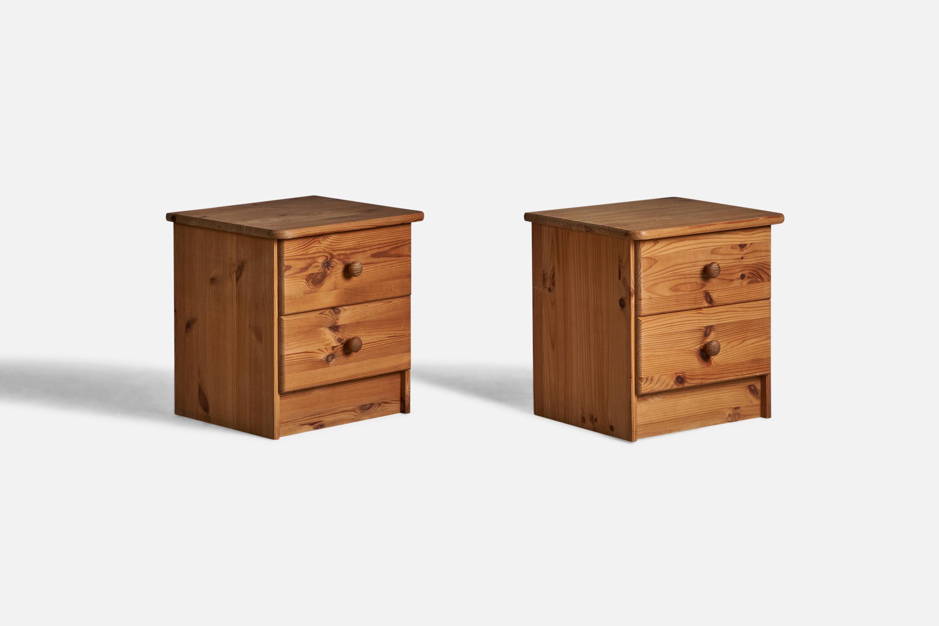 A pair of pine nightstands or bedside cabinets designed and produced in Denmark, 1960s.