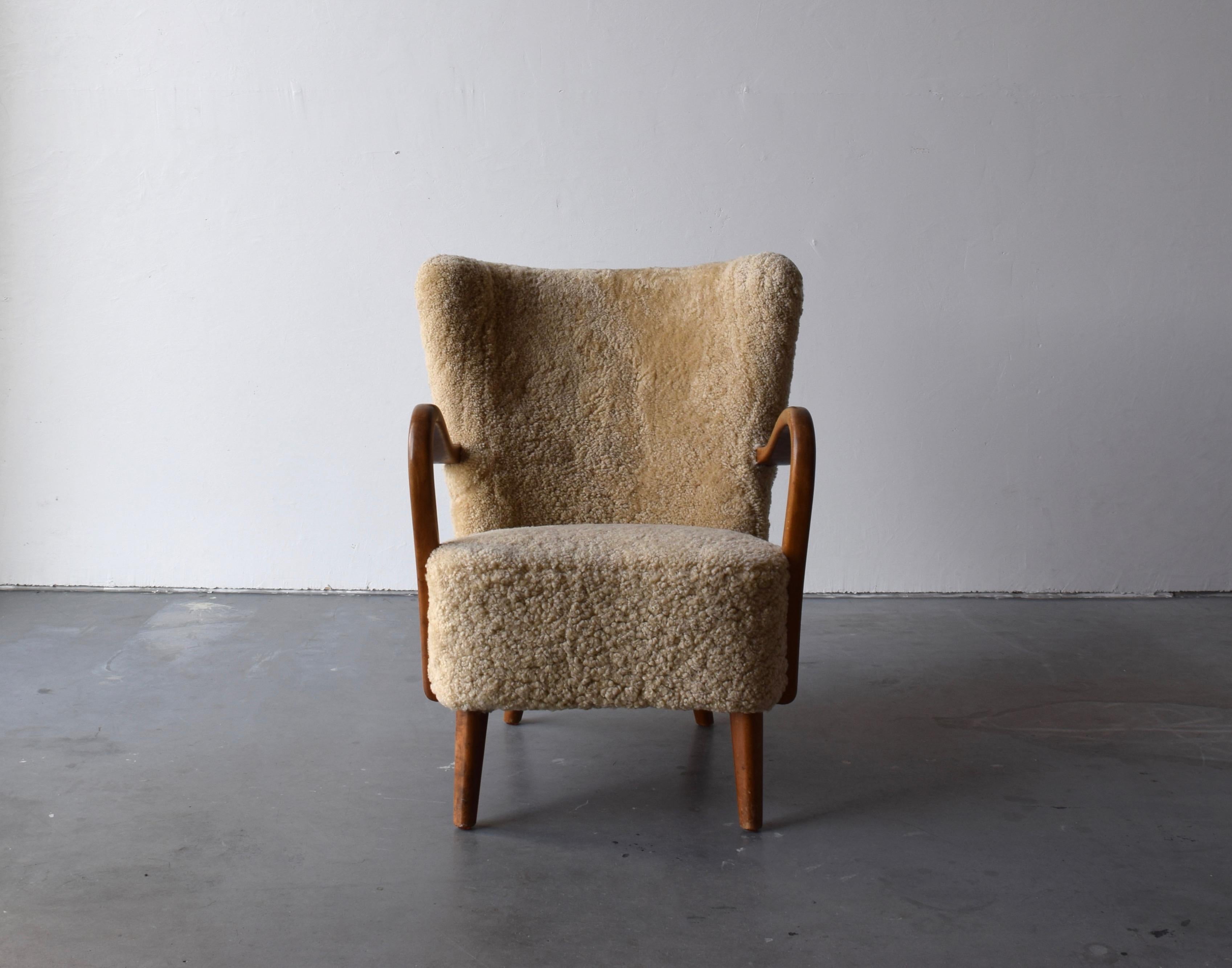 Organic Modern Danish Designer, Organic Lounge Chair, Sheepskin, Wood, Denmark, 1940s