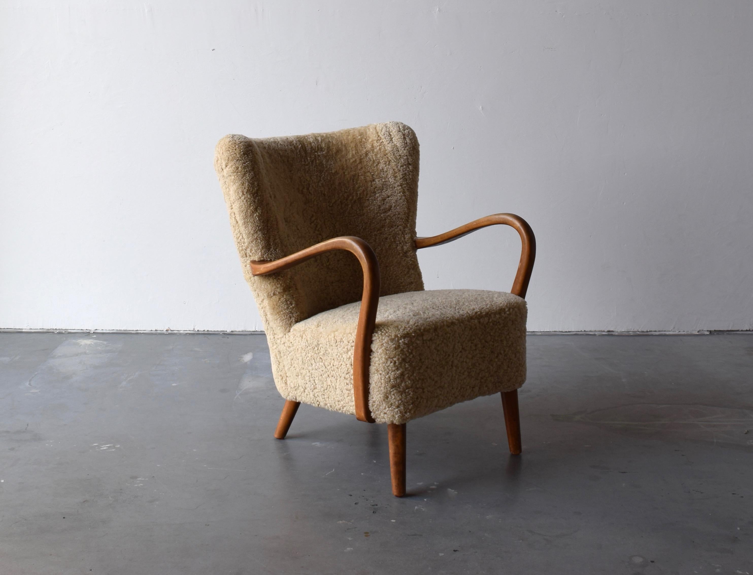 Danish Designer, Organic Lounge Chair, Sheepskin, Wood, Denmark, 1940s In Good Condition In High Point, NC