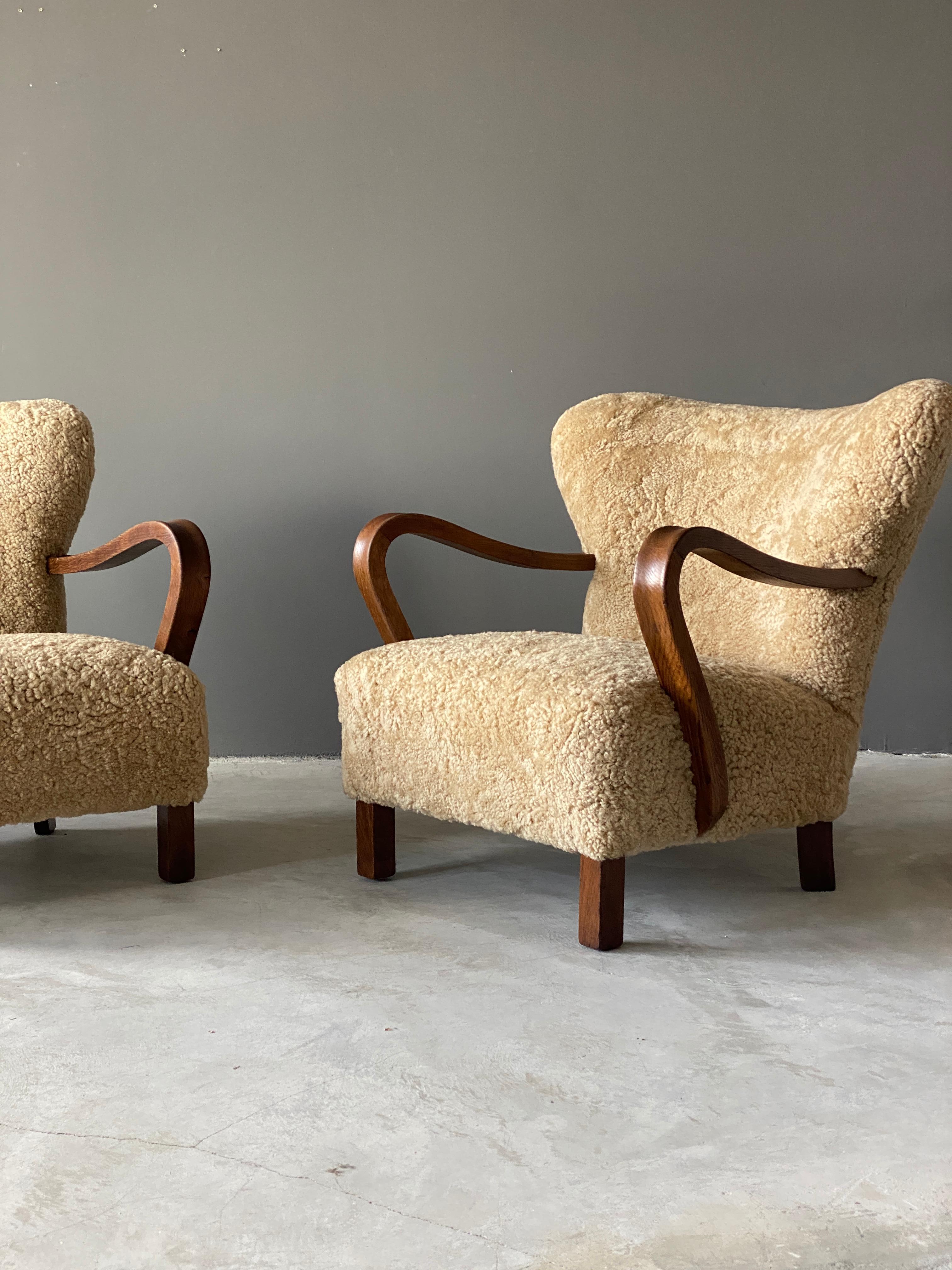 Danish Designer, Organic Lounge Chairs, Sheepskin, Stained Beech, Denmark, 1940s In Good Condition In High Point, NC