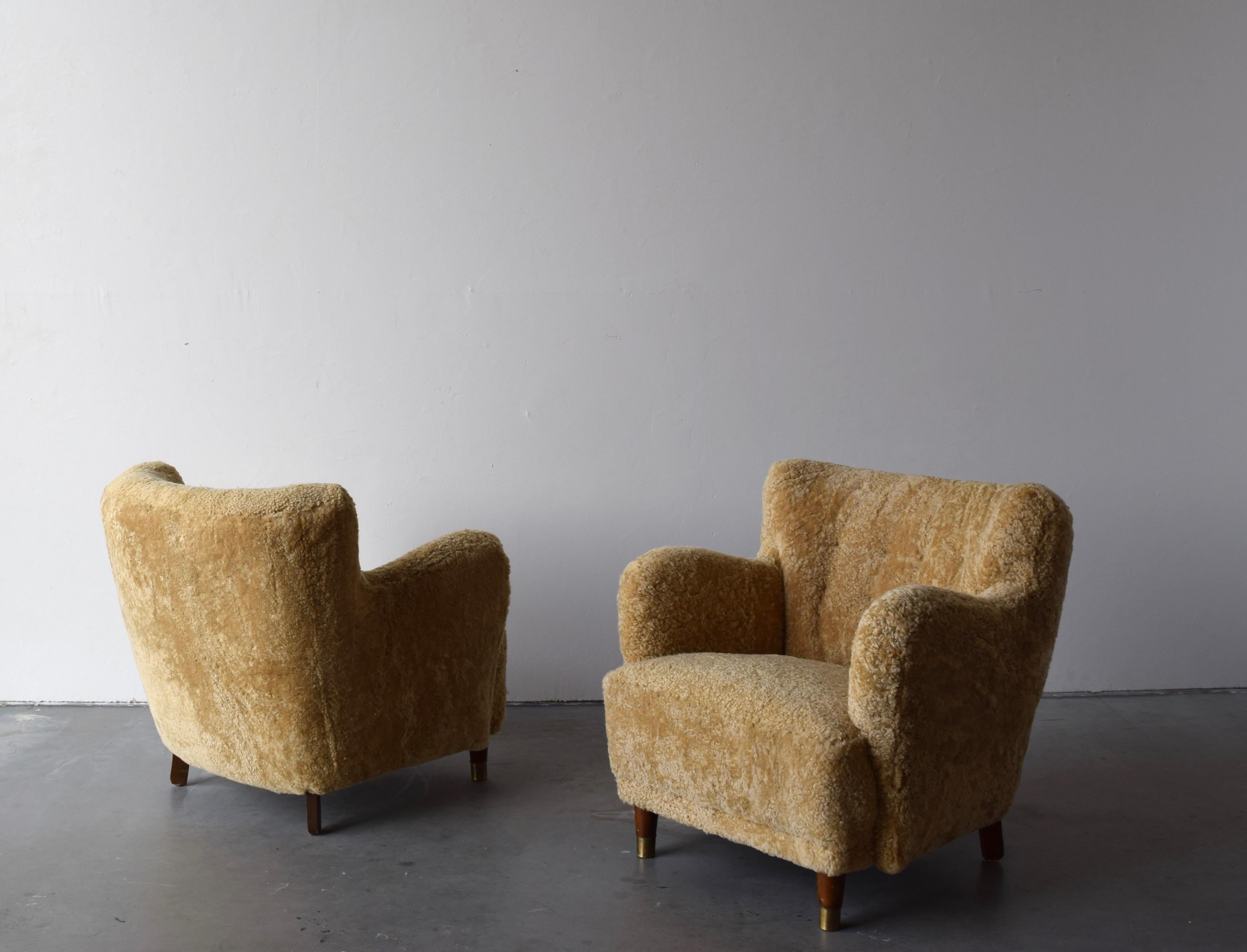 Organic Modern Danish Designer, Organic Lounge Chairs, Sheepskin, Wood, Brass, Denmark, 1940s