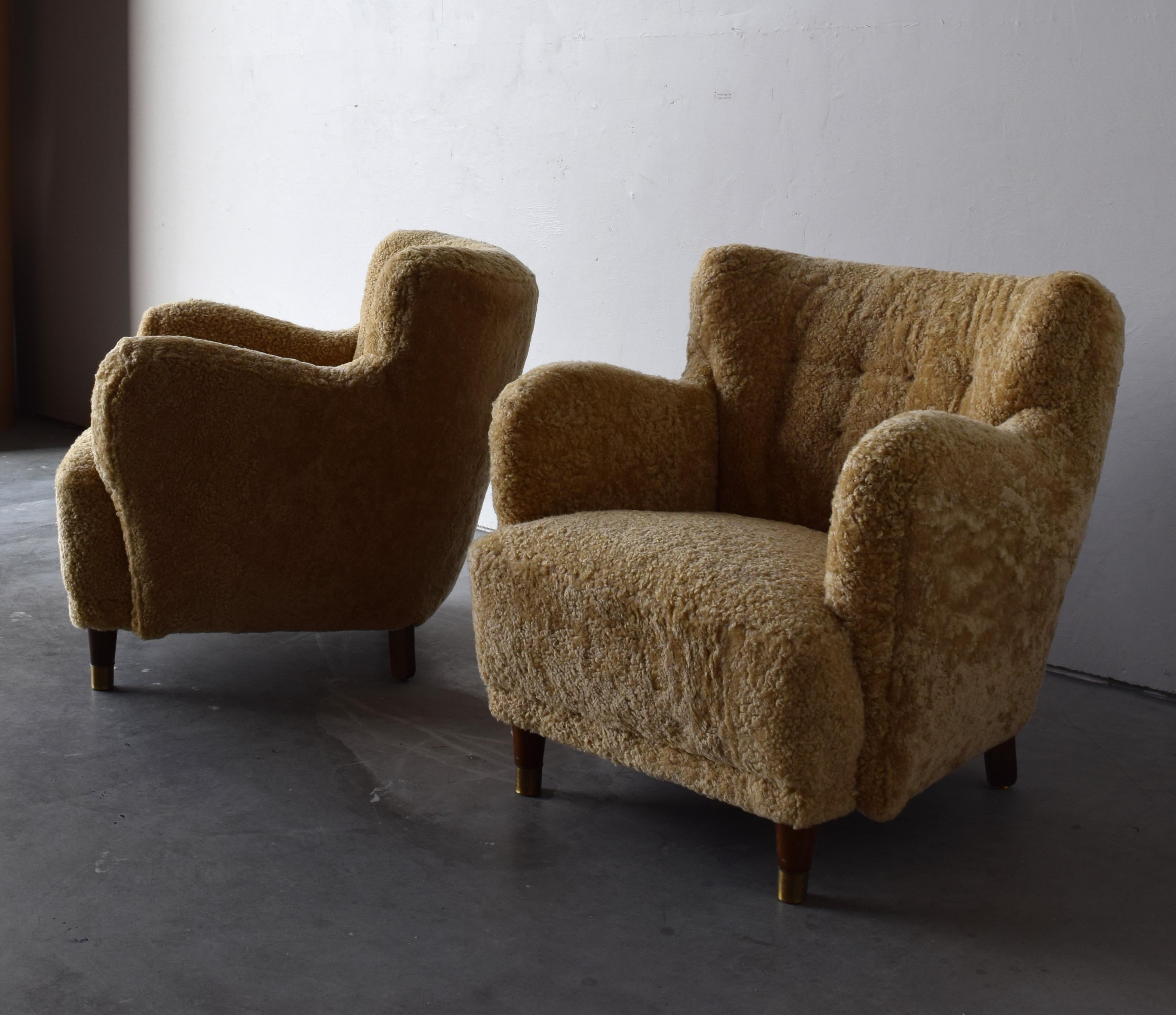 Mid-20th Century Danish Designer, Organic Lounge Chairs, Sheepskin, Wood, Brass, Denmark, 1940s