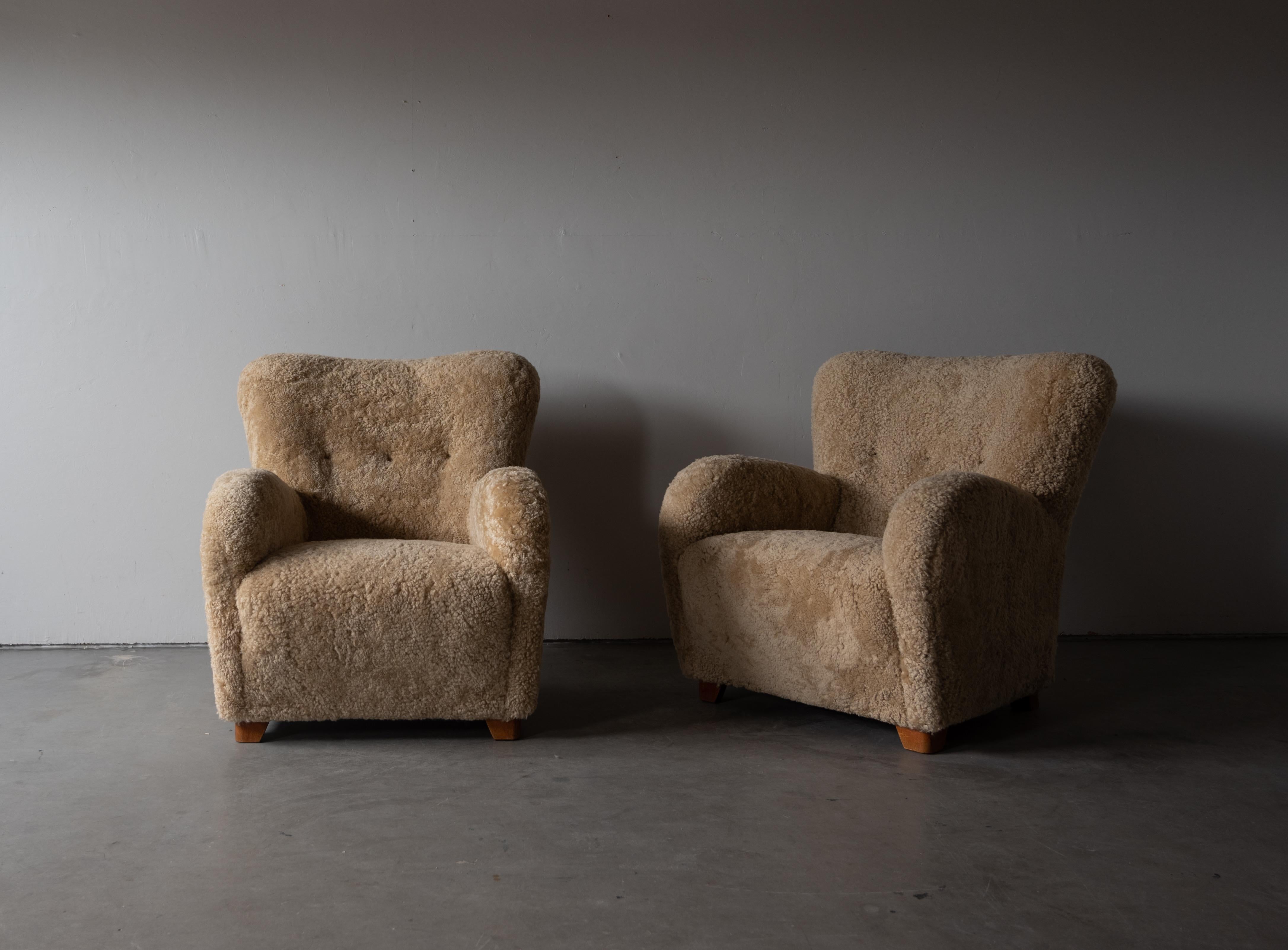 Mid-20th Century Danish Designer, Organic Lounge Chairs, Sheepskin, Wood, Denmark, 1940s