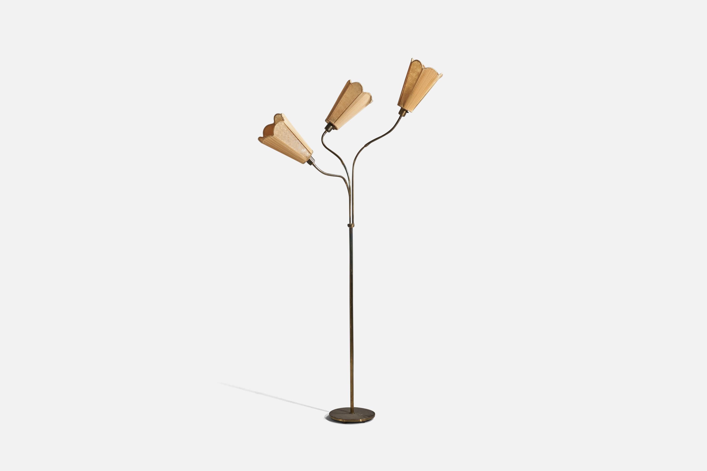 A brass and fabric, adjustable floor lamp designed and produced in Denmark, 1940s.

Variable dimensions, measured as illustrated in the first image.

Sold with Lampshade(s). 
Stated dimensions refer to the Floor Lamp with the Shade(s). 

Socket