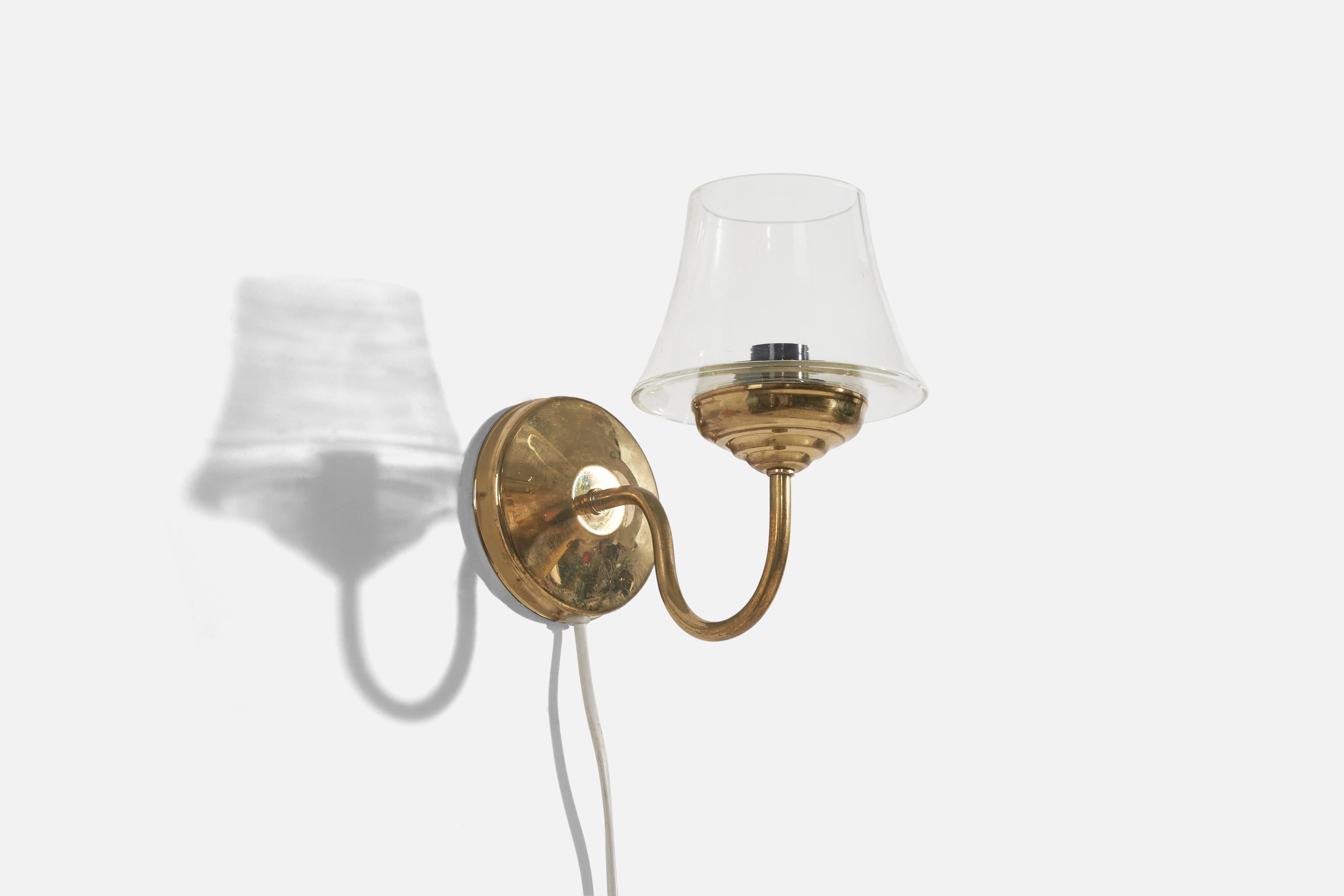 A brass and glass sconce designed and produced in Denmark, 1970s. 

Dimensions of back plate (inches) : 4.41 x 4.41 x 1.19 (H x W x D).