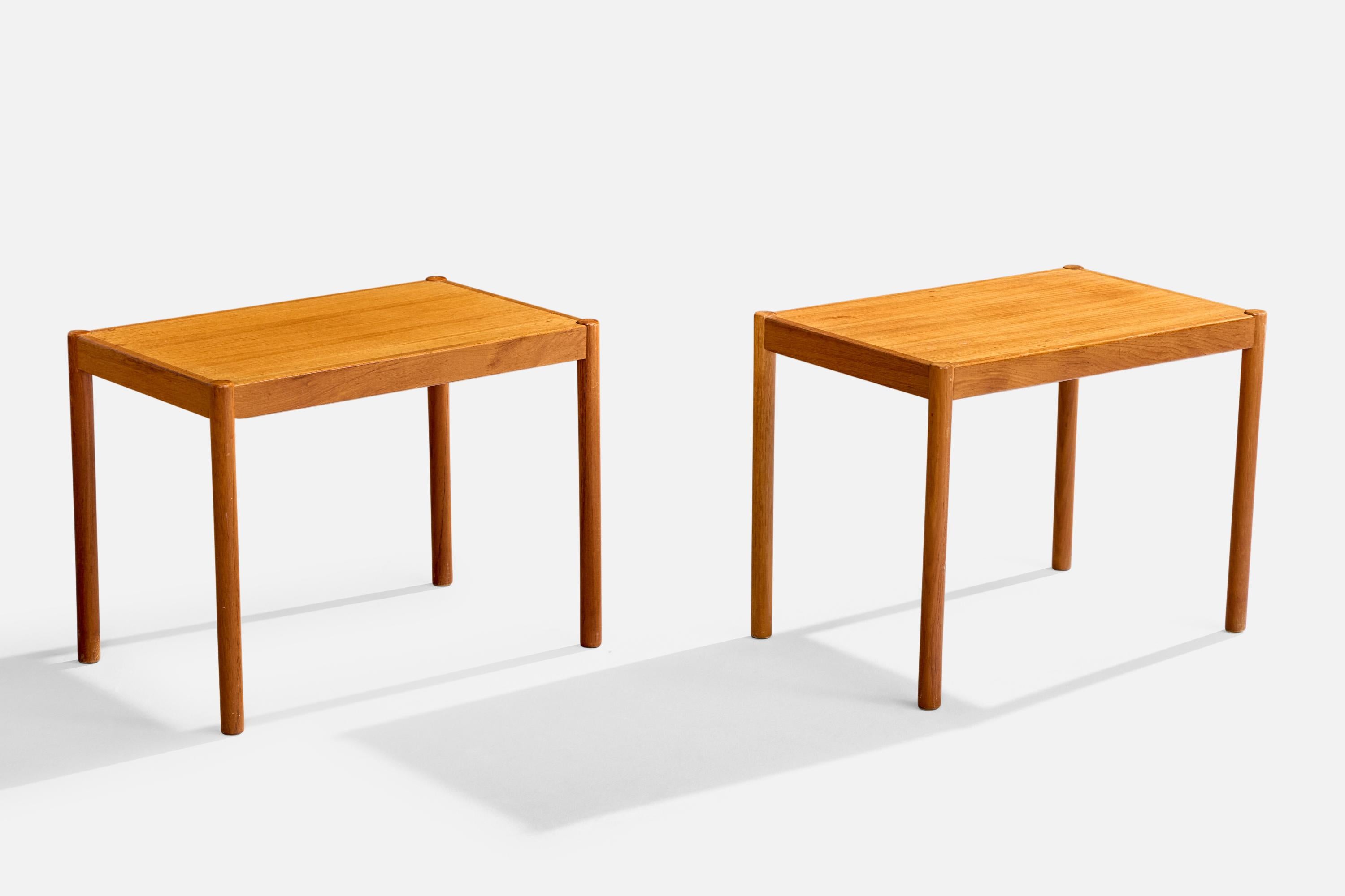 A pair of teak side tables designed and produced in Denmark, c. 1960s.

Overall Dimensions (inches): 17.375