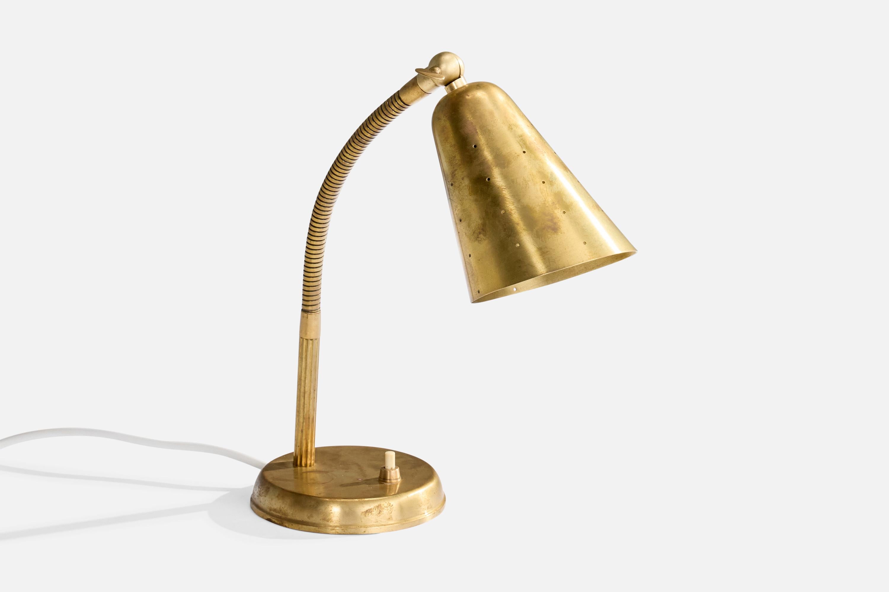 An adjustable brass table lamp designed and produced in Denmark, c. 1940s.

Dimensions of Lamp (inches): 10.125