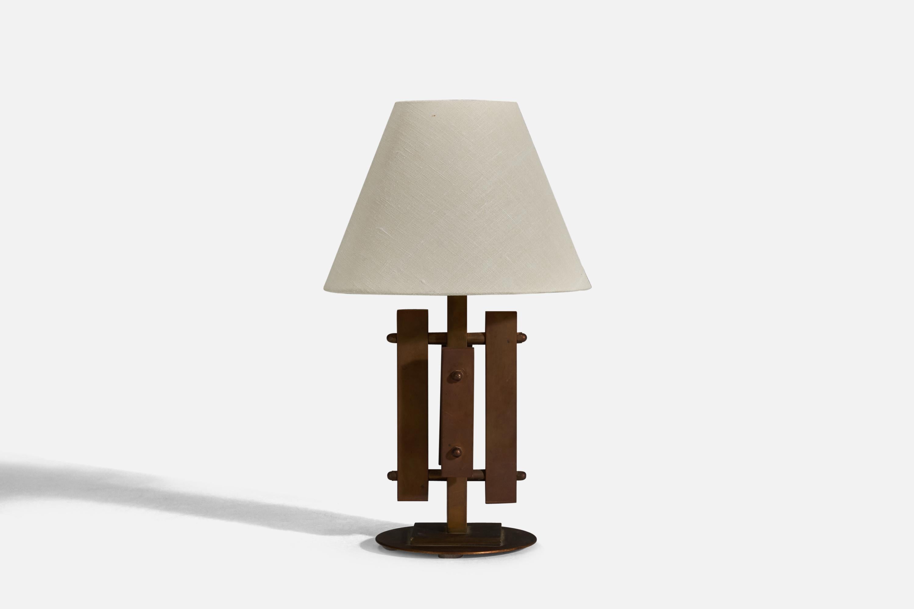 A brass table lamp designed and produced in Denmark, 1960s. 

Sold without Lampshade
Dimensions of Lamp (inches) : 10.87 x 5.12 x 5.12 (Height x Width x Depth)
Dimensions of Lampshade (inches) : 4 x 8 x 6 (Top Diameter x Bottom Diameter x