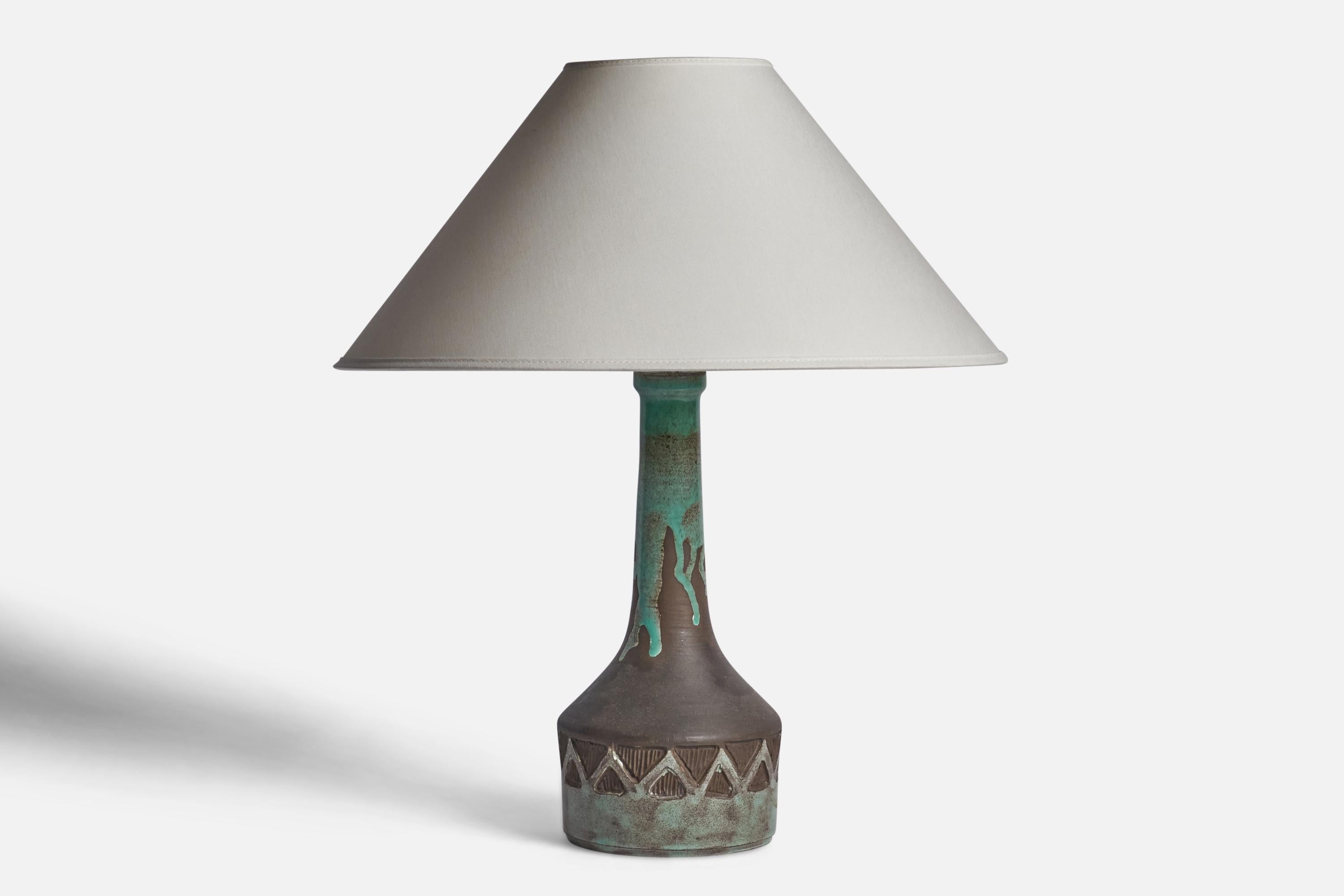 A green and grey-glazed stoneware table lamp designed and produced in Denmark, 1960s.

Dimensions of Lamp (inches): 14.25