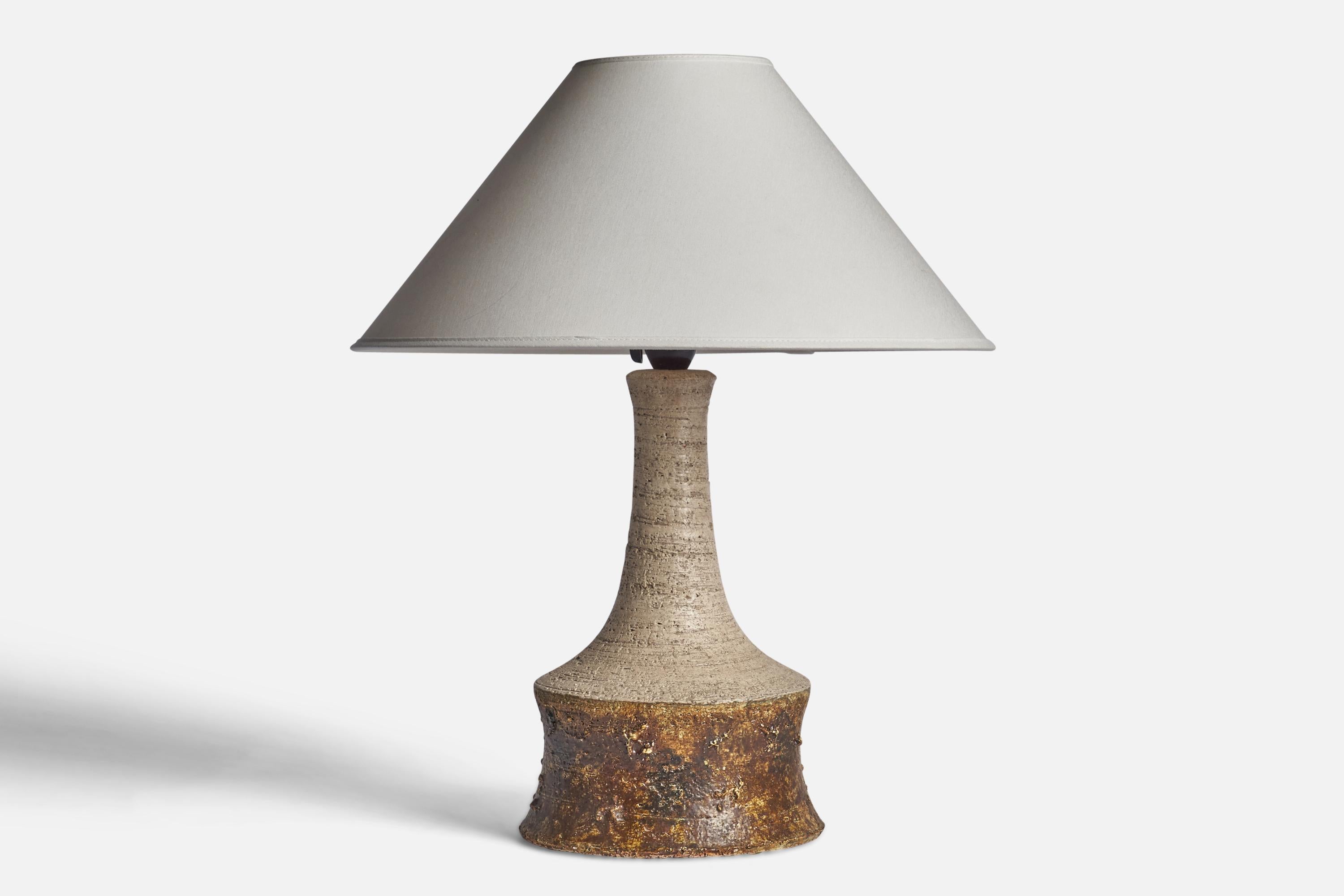 A light grey and brown-glazed stoneware table lamp designed and produced in Denmark, 1960s.

Dimensions of Lamp (inches): 14.75” H x 7.5” Diameter
Dimensions of Shade (inches): 4.5” Top Diameter x 16” Bottom Diameter x 7.25” H
Dimensions of Lamp