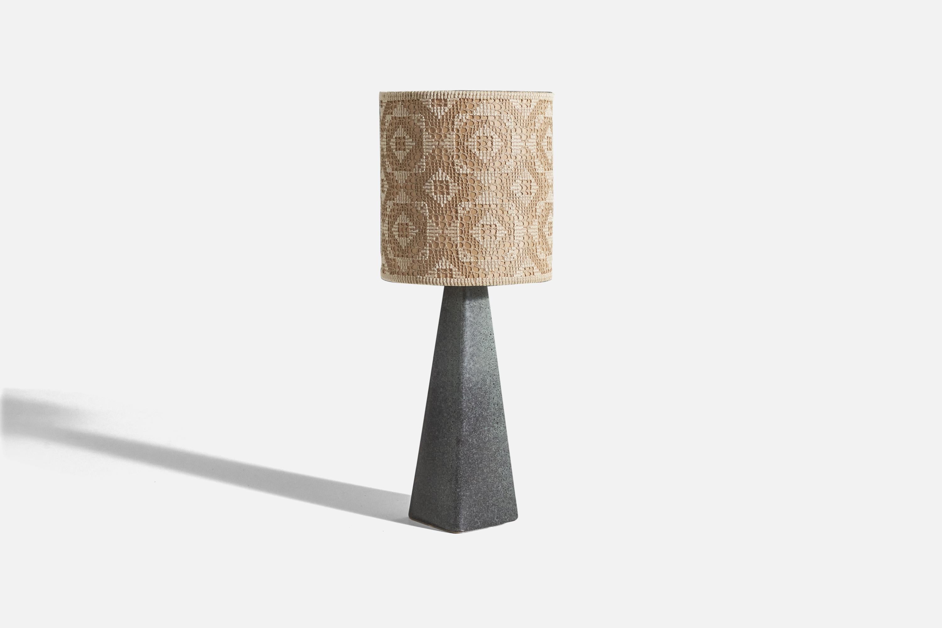 A gray glazed stoneware and embroidered fabric table lamp designed and produced by a Danish designer, Denmark, c. 1960s.

Sold with lampshade. 
Dimensions of Lamp (inches) : 14.5 x 4.95 x 3.85 (Height x Width x Depth)
Dimensions of Shade (inches) :