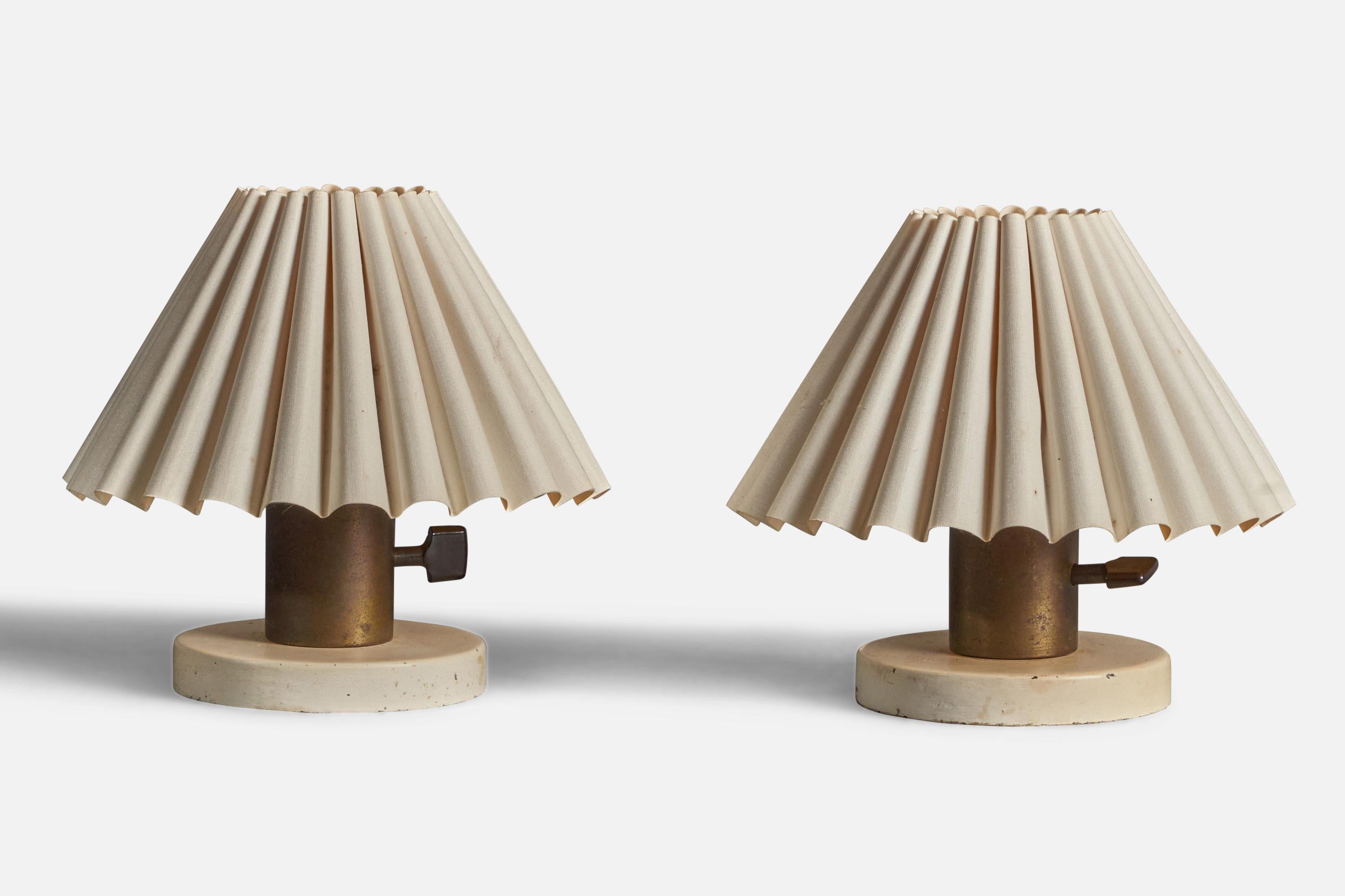 A pair of brass, white-lacquered metal and white paper lampshade table lamps designed and produced in Denmark, 1940s.

Overall Dimensions (inches): 7.5” H x 7.75” Diameter
Bulb Specifications: E-26 Bulb
Number of Sockets: 1