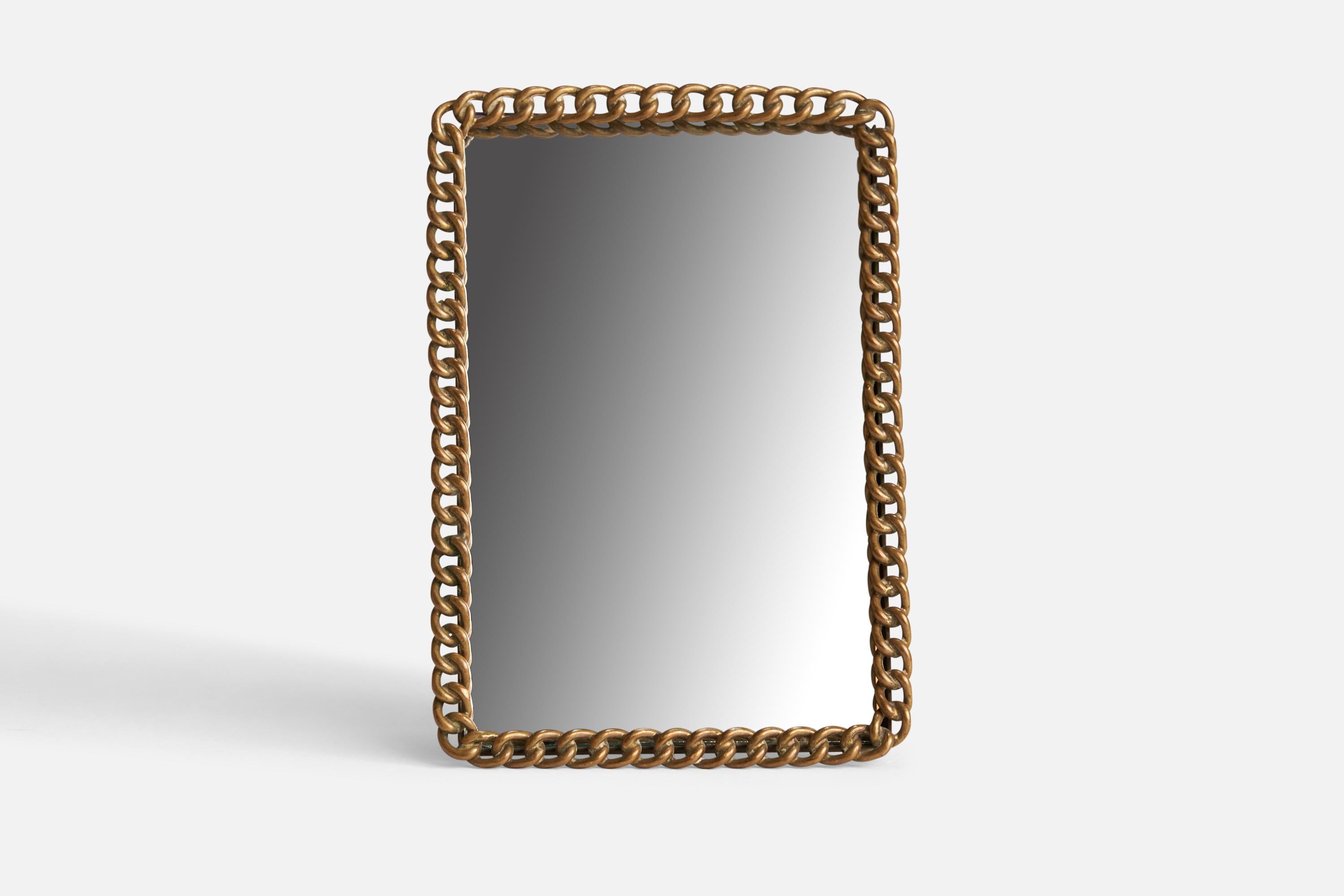 A small brass table mirror designed and produced in Denmark, 1930s.
