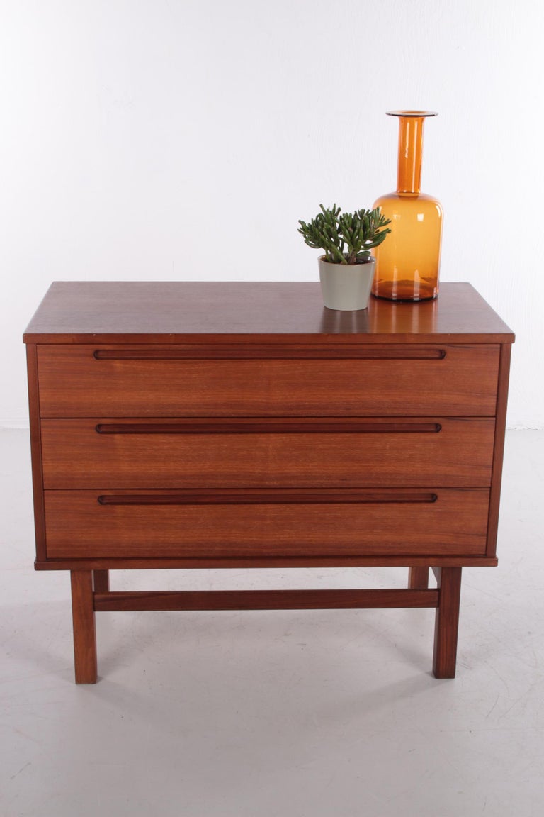 This high-quality chest of drawers was designed by Nils Jonsson for HJN Møbler.

It was manufactured in Denmark in the 1960s. That typical mid-century Scandinavian style is also reflected in the design of the cabinet.

The piece features fine