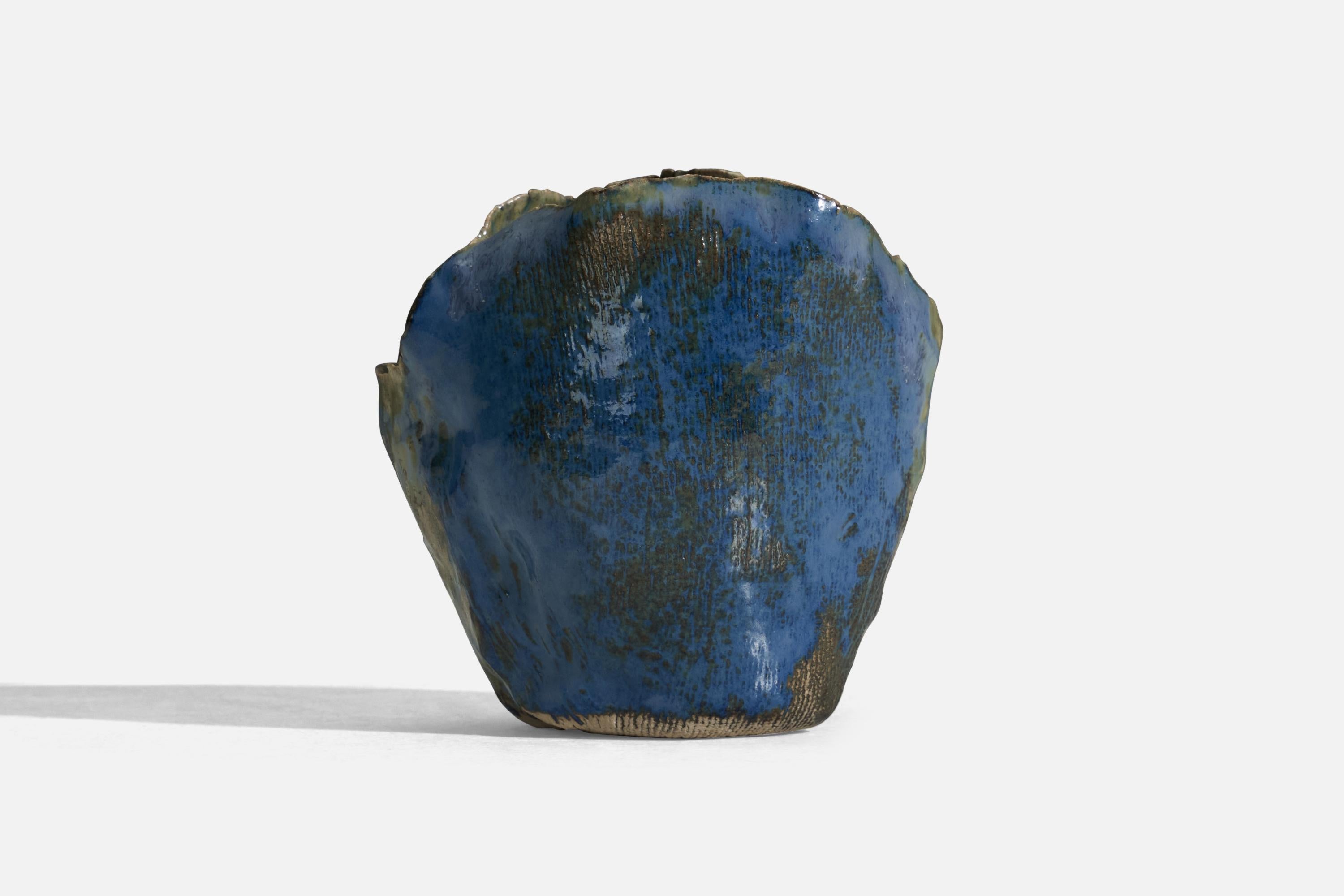 A blue glazed stoneware vase designed and produced in Denmark, 1970s. 

Present vase is unique studio work.