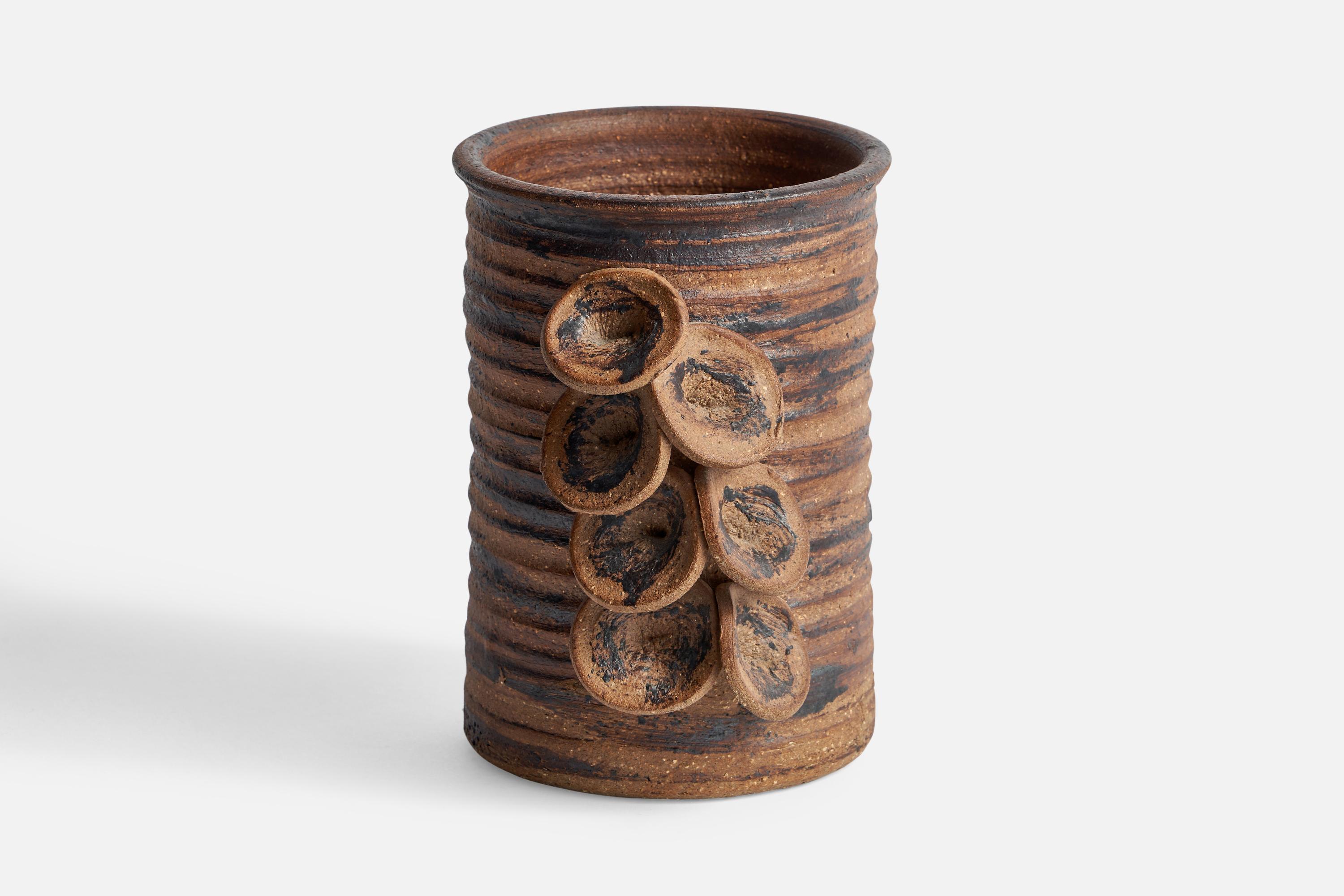 A brown and black ceramic vase designed and produced in Denmark, c. 1960s.