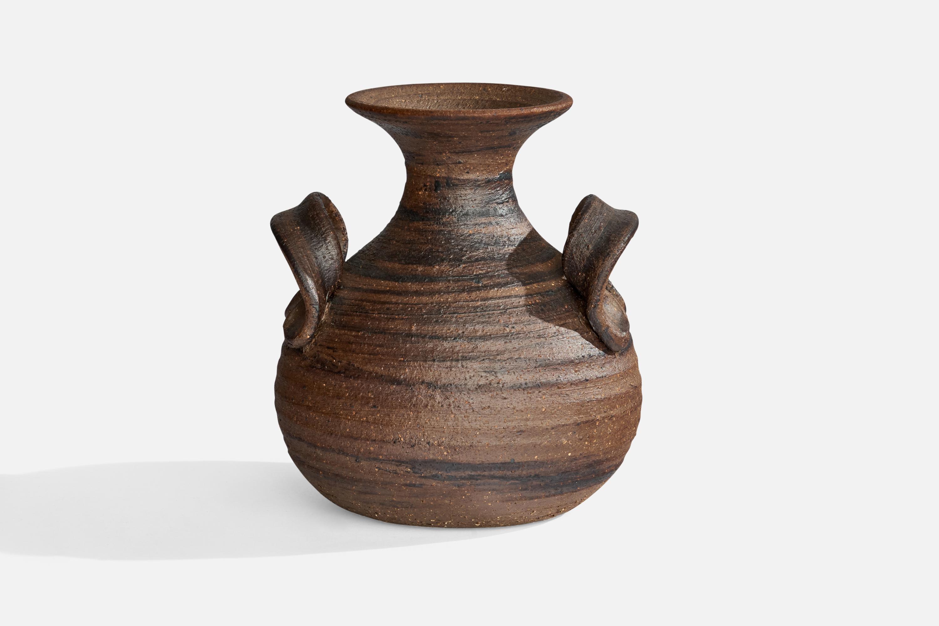 A brown and black-glazed stoneware vase designed and produced in Denmark, c. 1960s.