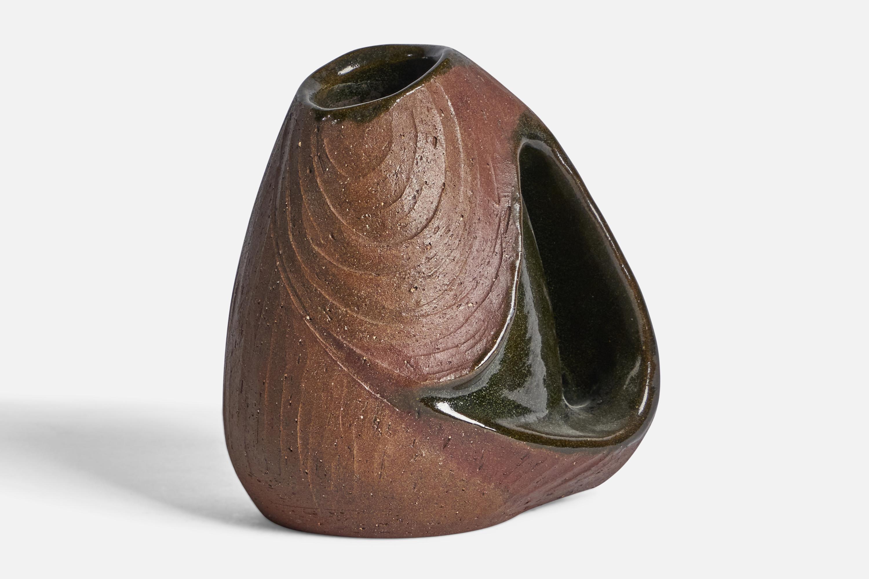 A semi-glazed brown and green stoneware vase designed and produced in Denmark, c. 1970s.
