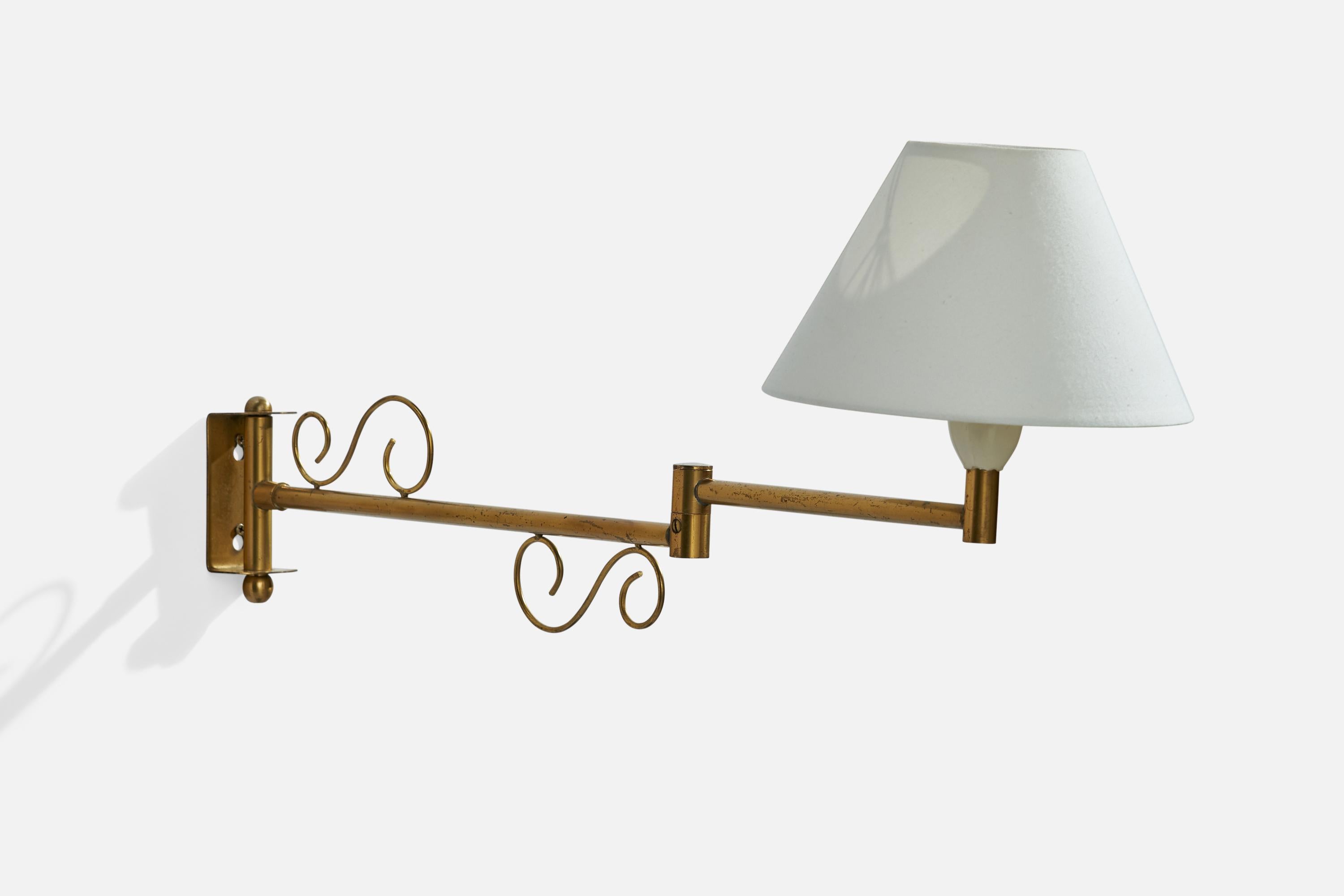 An adjustable brass and white fabric wall light designed and produced in Denmark, 1930s.

Dimensions variable.
Overall Dimensions (inches): 4.25” H x 15” W x 22” D
Back Plate Dimensions (inches): 4.25”  H x 15”  W x .25”  D
Bulb Specifications: E-26