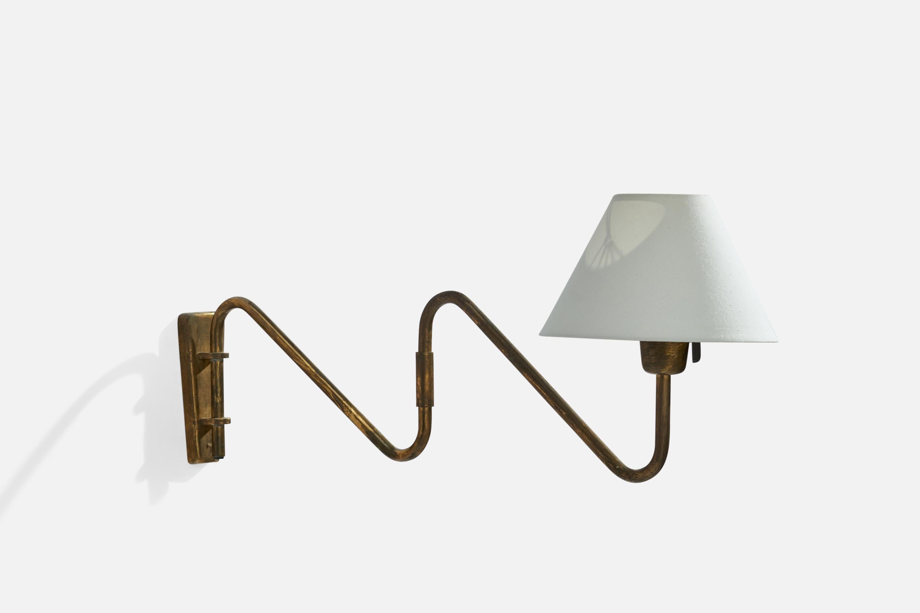 An adjustable brass and white fabric wall light designed and produced in Denmark, 1930s.

Dimensions variable.

Overall Dimensions (inches): 6.5” H x 11”  W x 25.5” D
Back Plate Dimensions (inches): 6”  H x 2”  W x .75”  D
Bulb Specifications: E-26