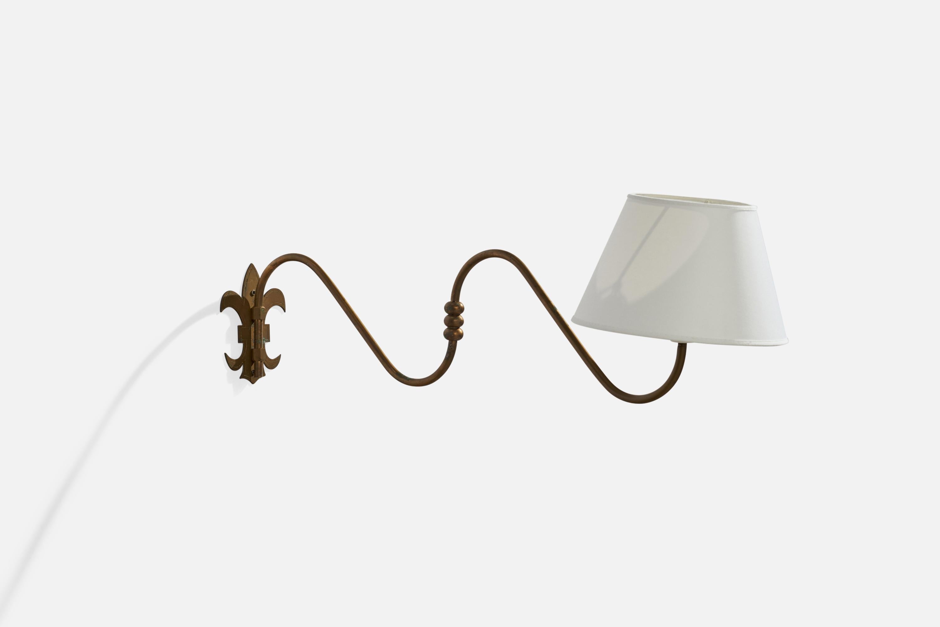 An adjustable brass and white fabric wall light designed and produced in Denmark, 1930s.

Dimensions variable.
Overall Dimensions (inches): 7”  H x 11.5” W x 22.5” D
Back Plate Dimensions (inches): 5.25”  H x 4.25”  W x .25” D
Bulb Specifications: