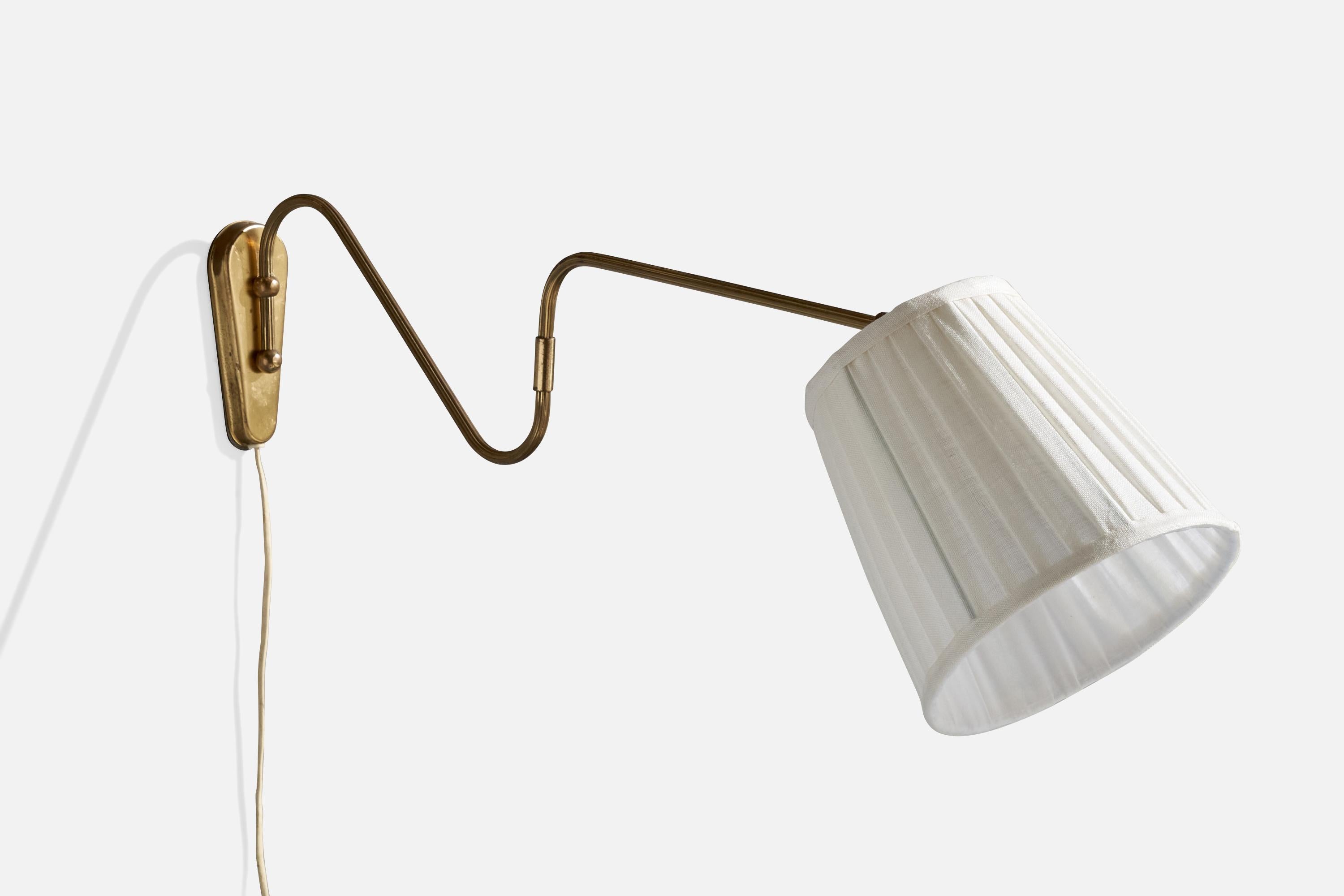 A brass and white fabric wall light designed and produced in Denmark, c. 1940s.

Dimensions variable.

Fully extended, lamp measures:  8.125” H x  8.125” W x  33.125“D (inches)
Back Plate Dimensions (Inches):  ” H x ” W x ” D
Bulb Specifications: