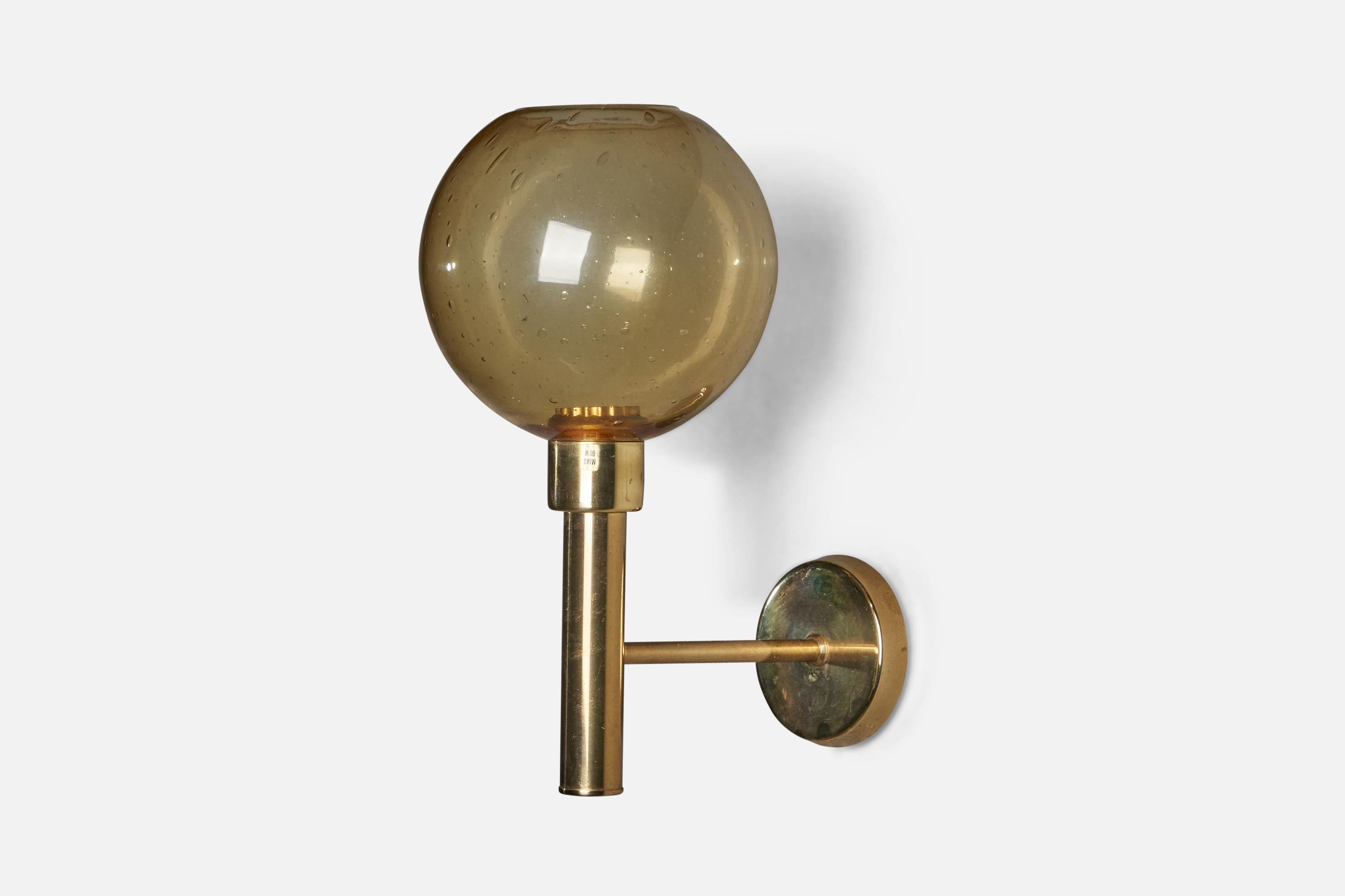 A brass and yellow blown glass wall light, designed and produced in Denmark, 1960s.

Overall Dimensions (inches): 14.5