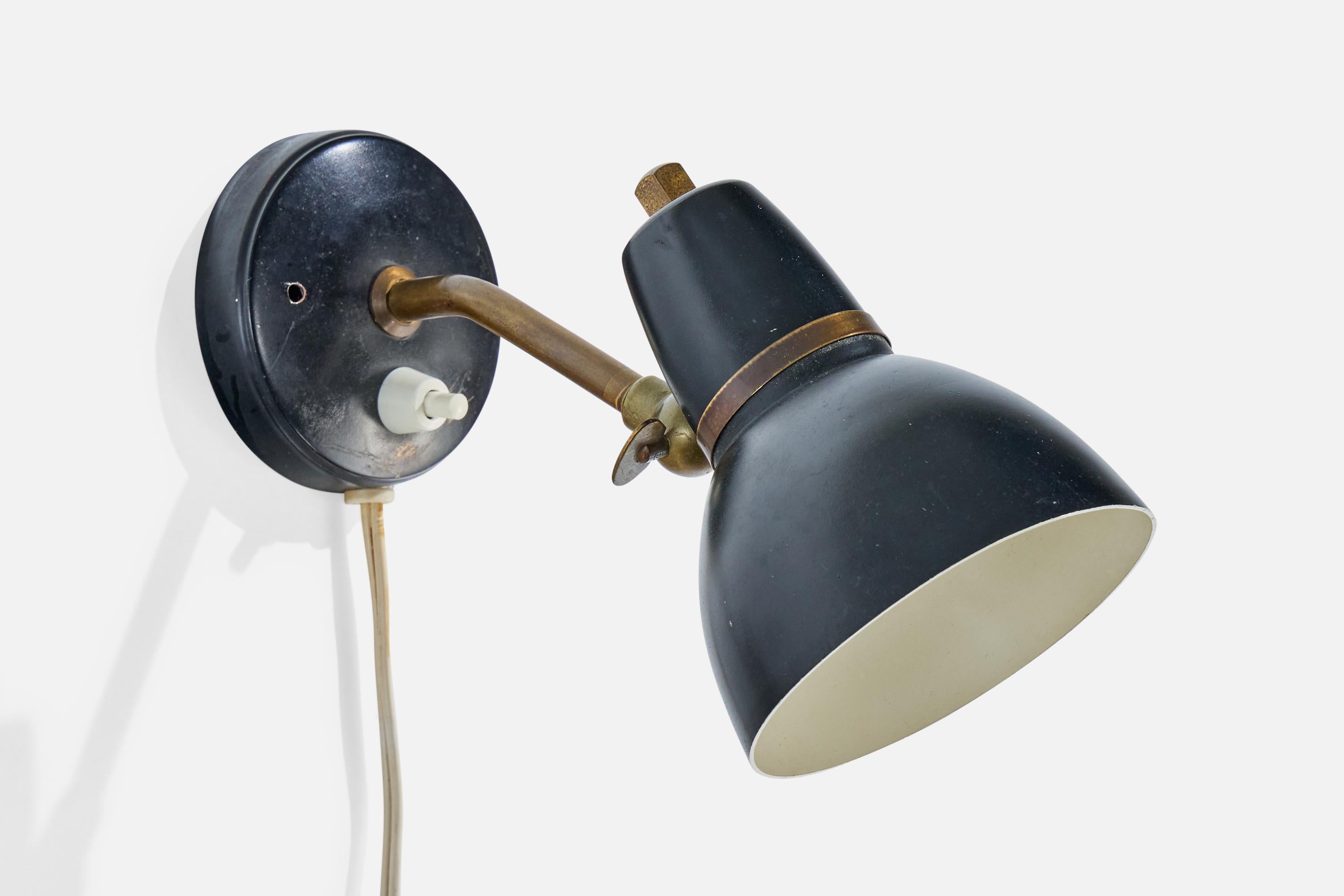 An adjustable brass and black-lacquered metal wall light designed and produced in Denmark, c. 1950s.

Loss of black lacquer present to metal

Oxidation present to brass

Wear consistent with age and use

Shade is adjustable; measured as