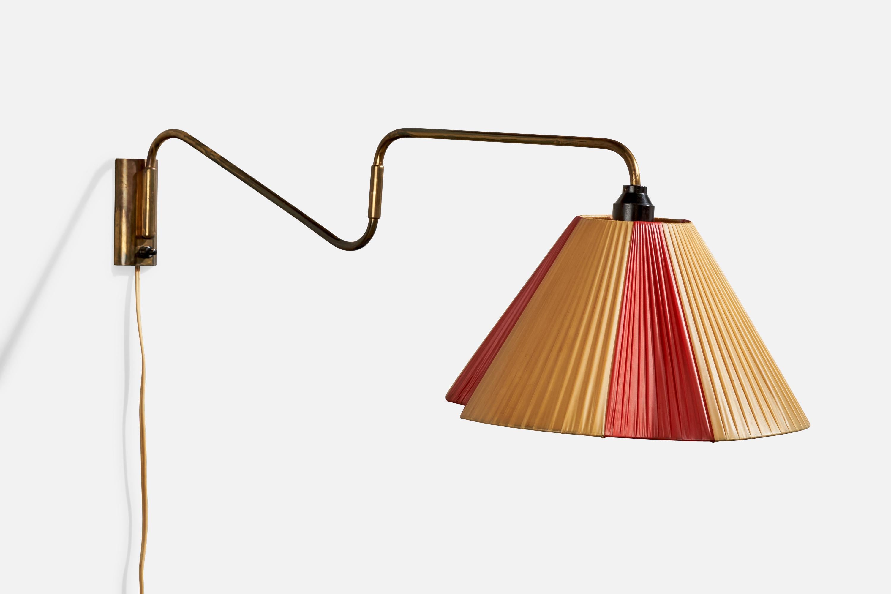 An adjustable brass and yellow red plastic band wall light designed and produced in Denmark, c. 1940s.

Overall Dimensions (inches):  11.5” H x  12.625” W x  32“ D

Back Plate Dimensions (Inches):  4.625” H x 2.125” W x .75” D

Bulb Specifications: