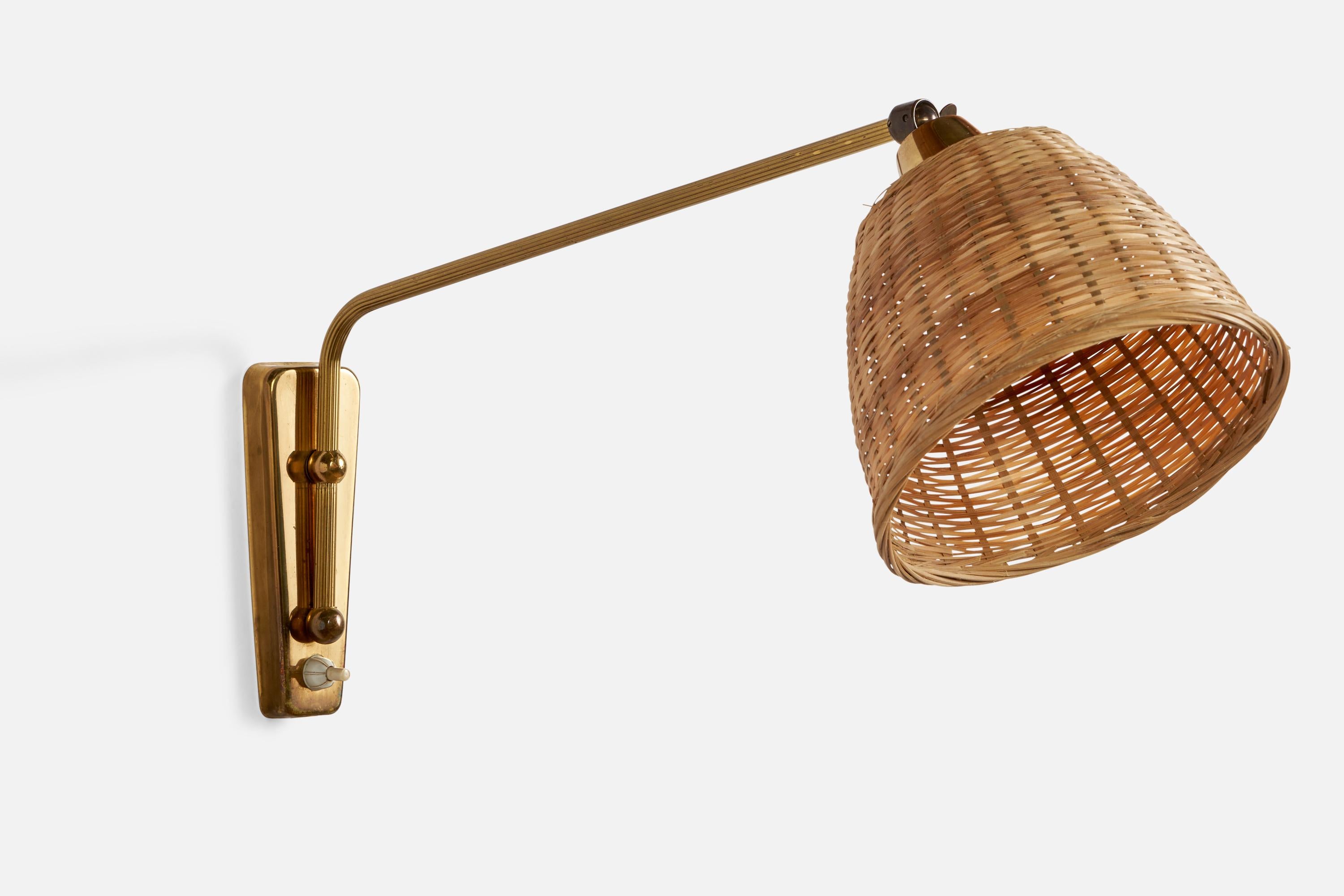 An adjustable brass and rattan wall light designed and produced in Denmark, 1940s.

Overall Dimensions (inches): 9.5” H x 6.5” W x 19.5” D
Back Plate Dimensions (inches): 6” H x 2.25” W x 0.65” D
Bulb Specifications: E-26 Bulb
Number of Sockets: