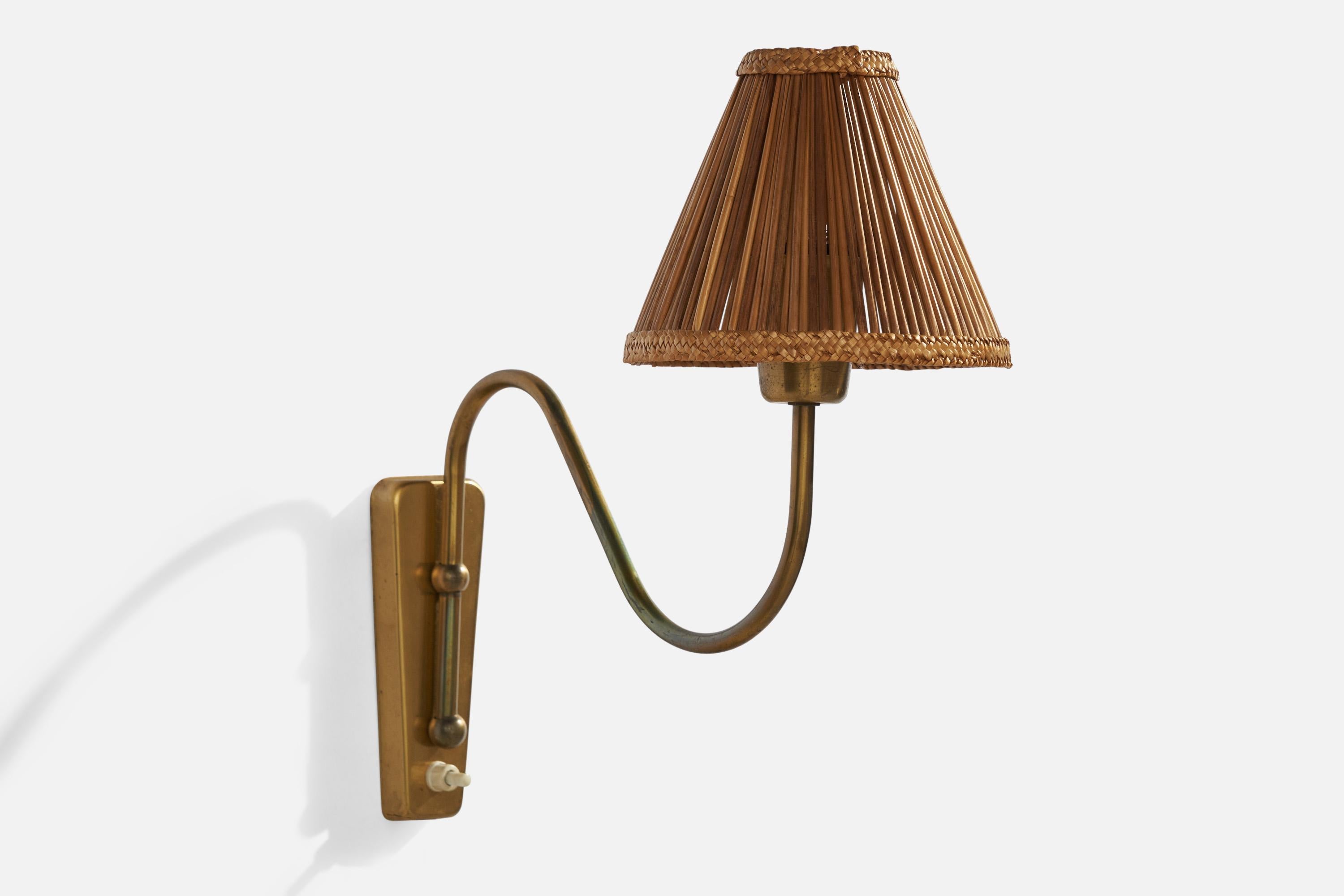 A brass and woven reed wall light designed and produced in Denmark, 1940s.

Overall Dimensions (inches): 13.5” H x 6” W x 13” D
Back Plate Dimensions (inches): 5.25 H x 2” W x .75” D
Bulb Specifications: E-26 Bulb
Number of Sockets: 1
All lighting
