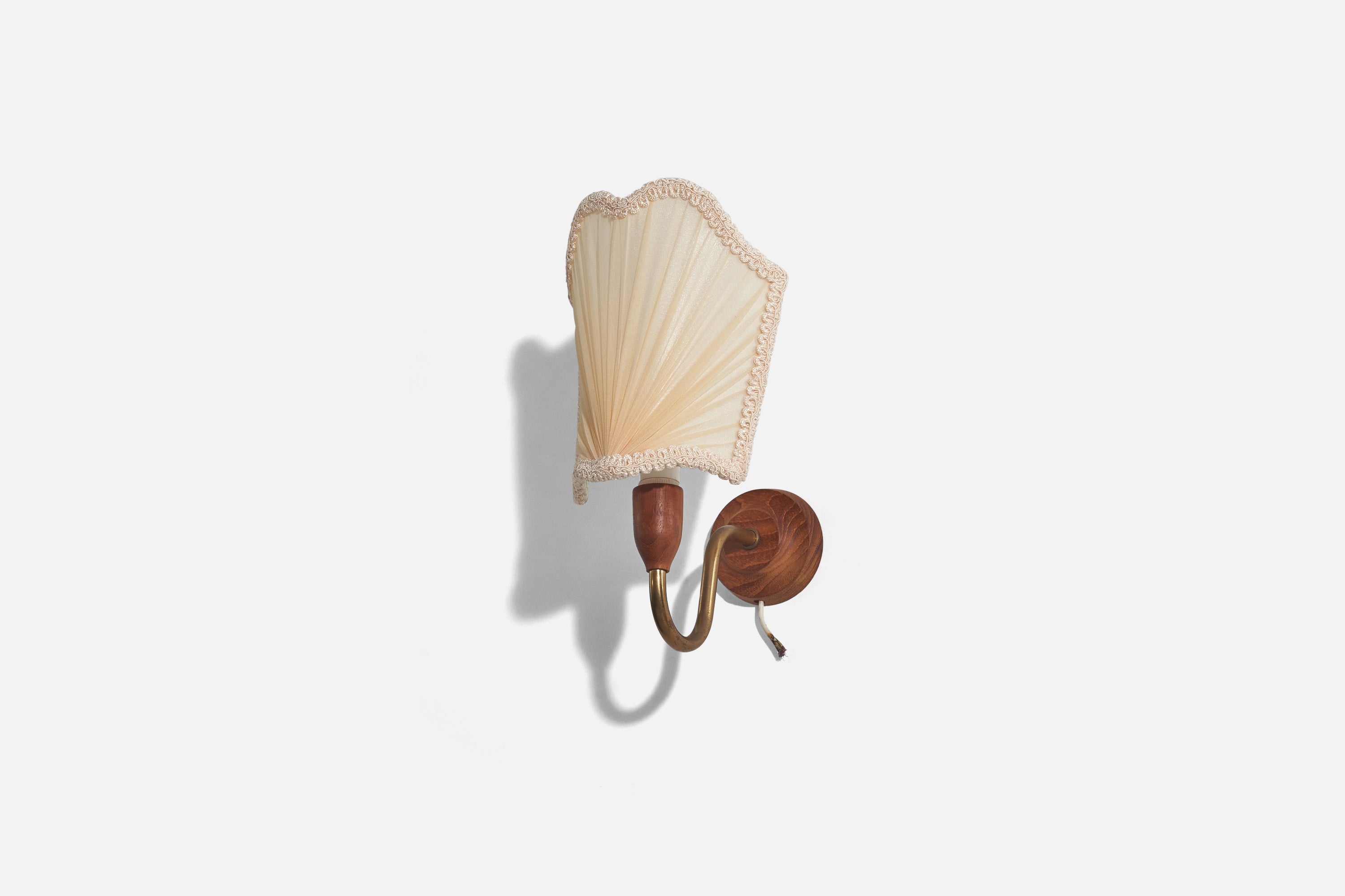 A brass, teak and fabric wall light designed and produced in Denmark, 1950s. 

Lampshade can be purchased with the lamp. 
Dimensions of back plate (inches) : 2.87 x 2.87 x 1 (H x W x D).