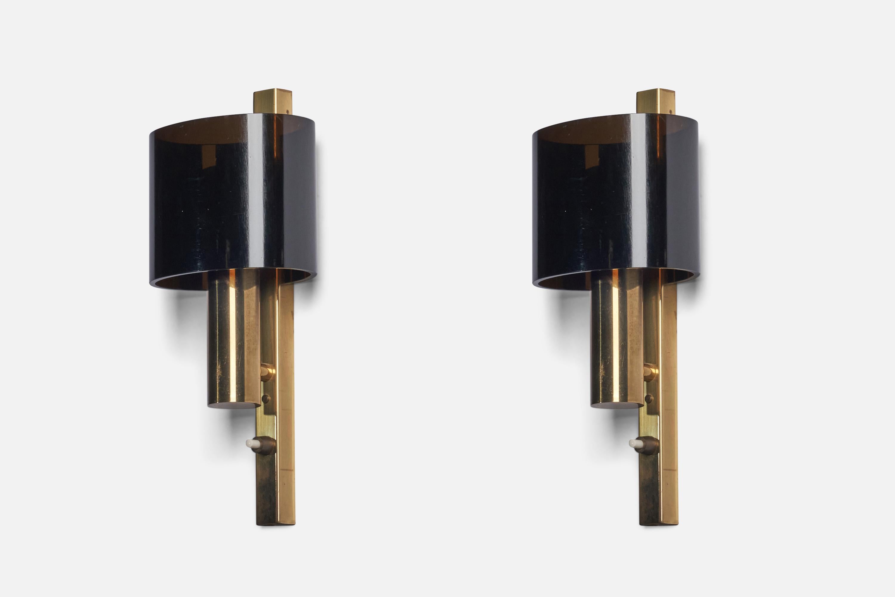 A pair of brass and smoked acrylic wall lights designed and produced in Denmark, 1960s.

Overall Dimensions (inches): 11.4