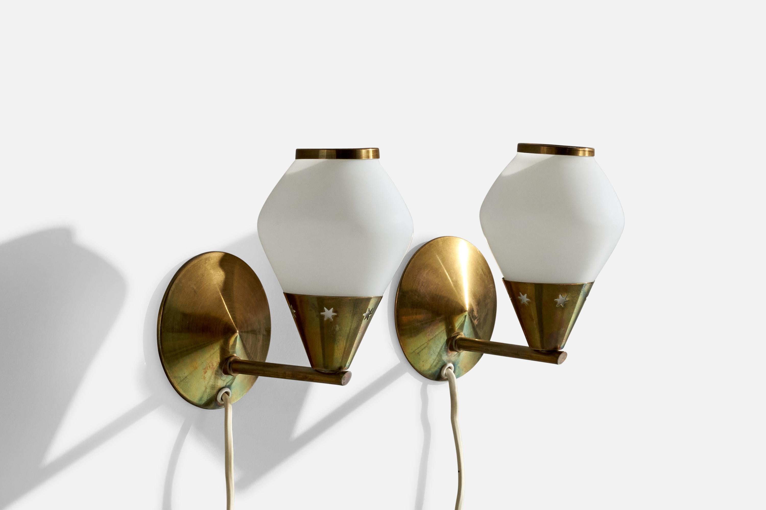 A pair of brass and opaline glass wall lights designed and produced in Denmark, c. 1950s.

Overall Dimensions (inches): 5.82