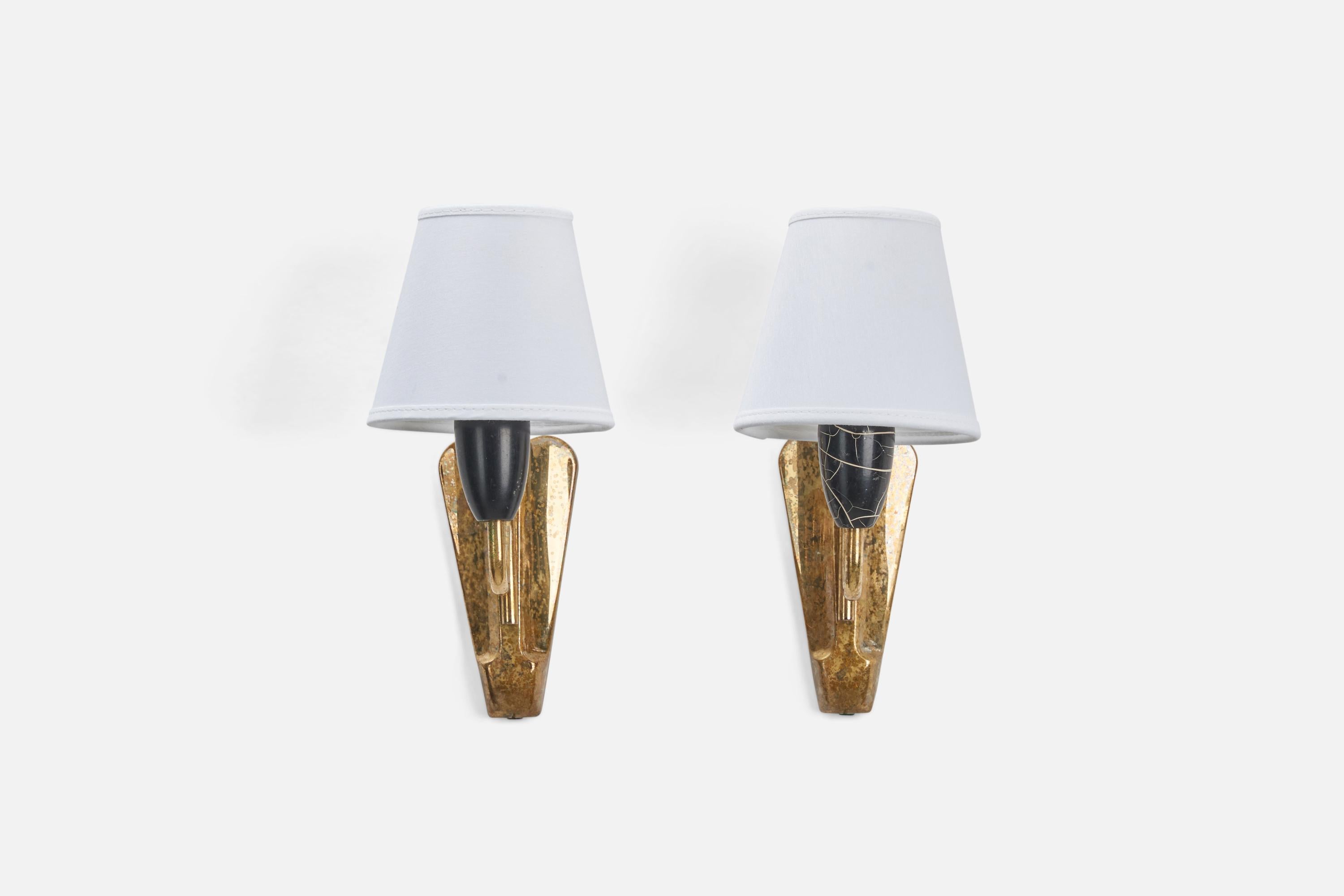 A pair of brass, resin and fabric wall lights designed and produced by Danish Designer, Denmark, 1950s.

Dimensions stated are of sconces with lampshades.

Dimensions of Back Plate (inches) : 5.15 x 2.57 x 0.86 (Height x Width x