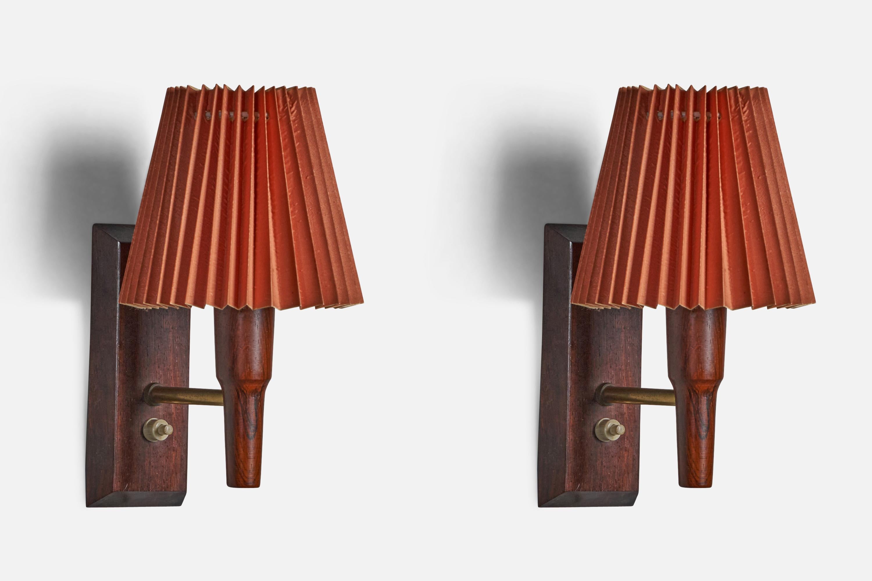 A pair of brass, rosewood and red paper wall lights, Denmark, 1950s

Overall Dimensions (inches): 9.5