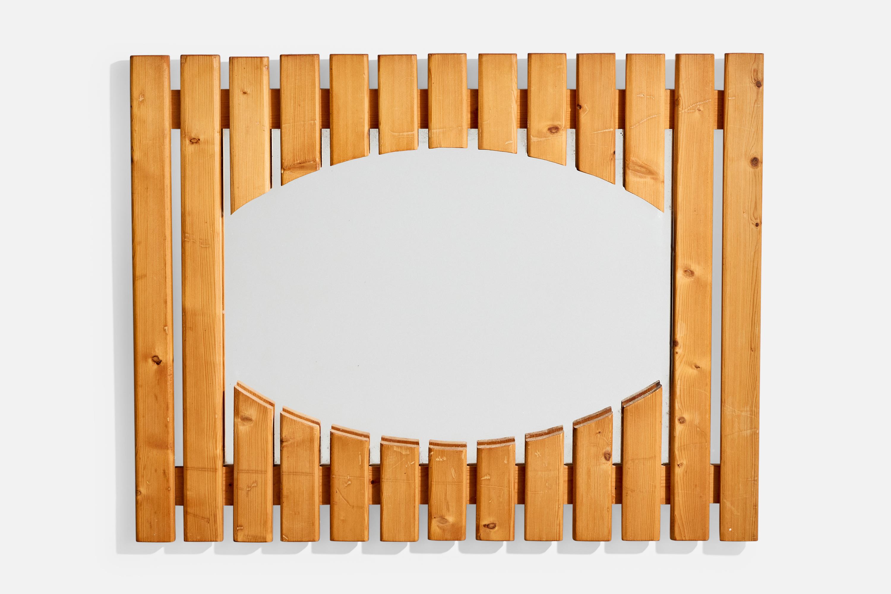 A sizeable, slated pine wall mirror designed and produced in Denmark, 1970s.

Overall Dimensions: 31.625