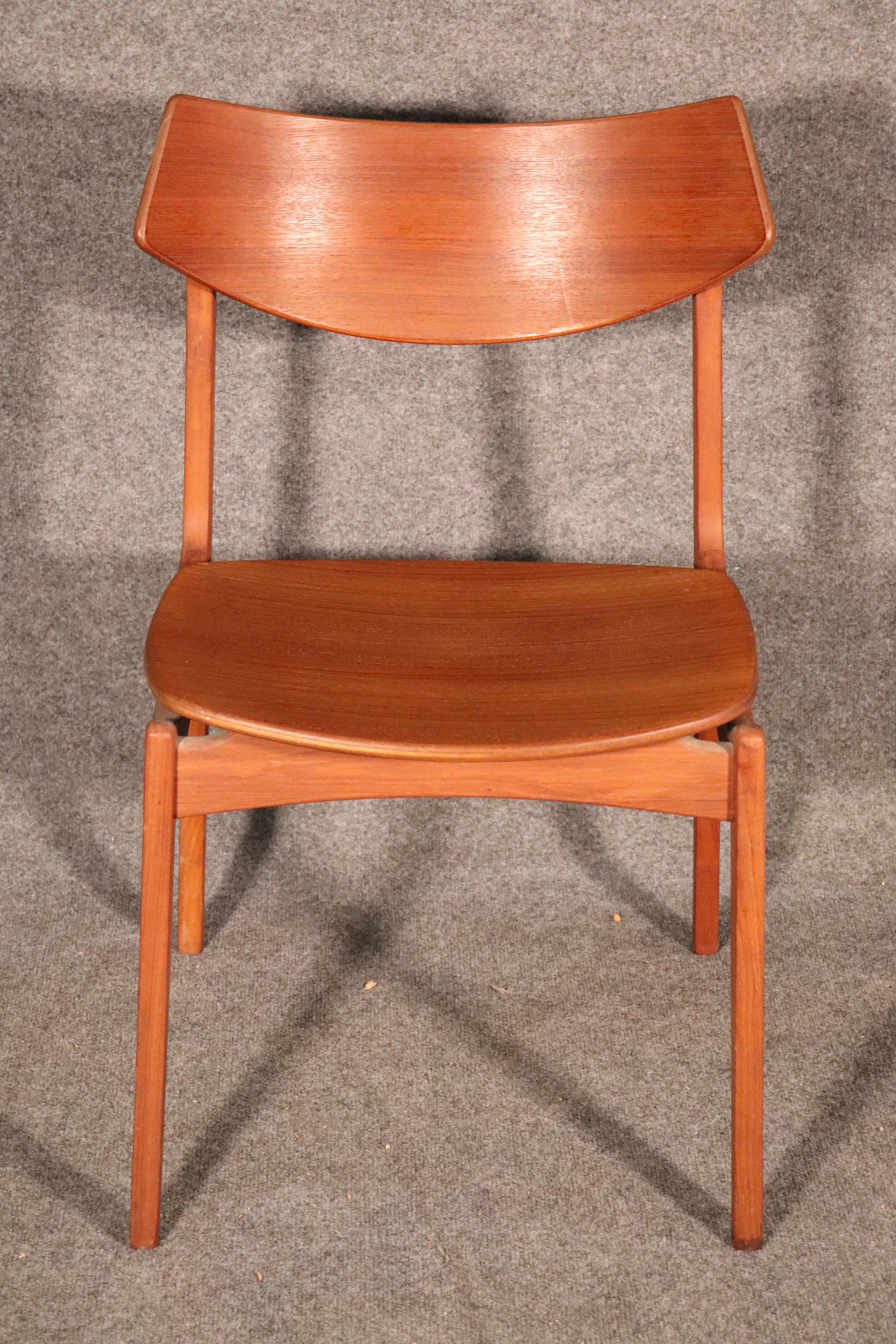 Single Danish chair with swooping back and floating seat. Great mid-century design for home or office use.
Please confirm location.