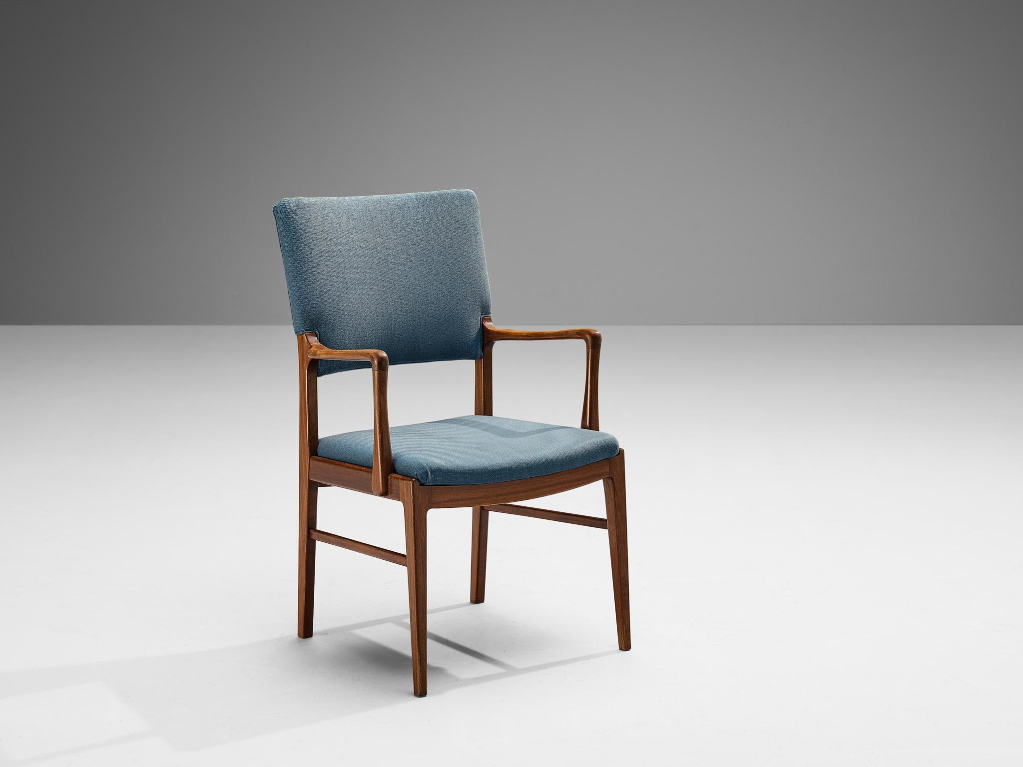Armchair, fabric, mahogany, Denmark, 1960s

This armchair of Danish origin is characterized by excellent craftsmanship and an elegant silhouette. The frame has an organic appearance due to the subtle curves in the armrests, further complemented by