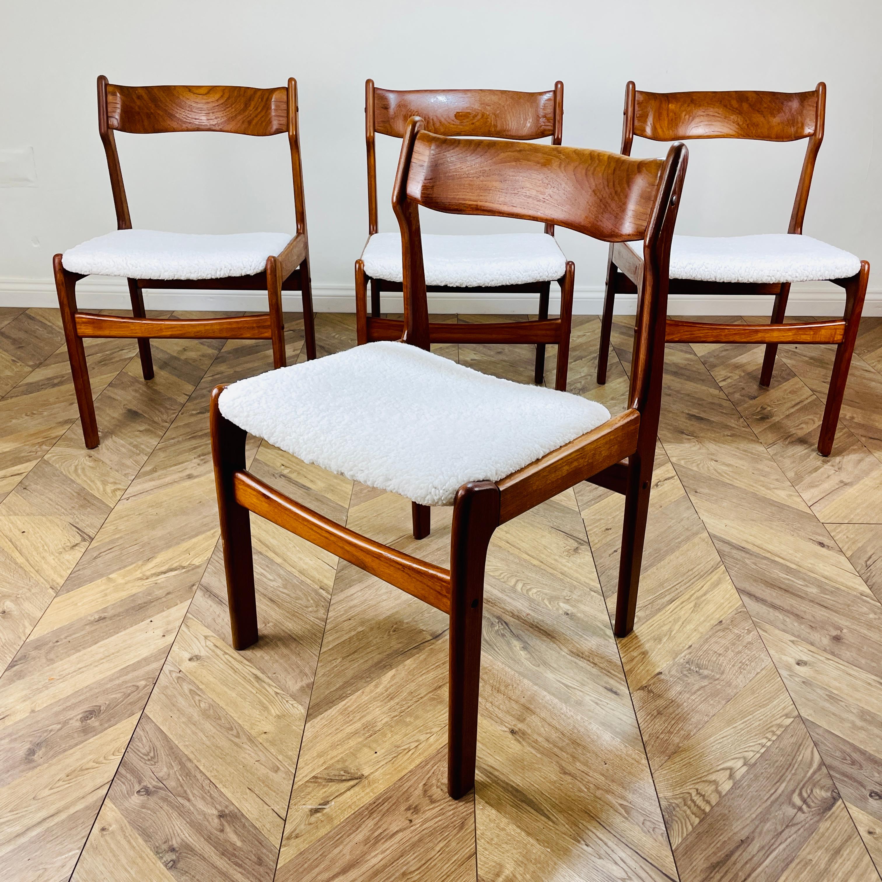 A Beautiful Set of 4, Teak Danish Dining Chairs Inspired by Erik Buch and manufactured in the 1970s.

The chair frames are all solid & completely original, in good overall condition with signs of use, in the form of scratches and abrasions,
