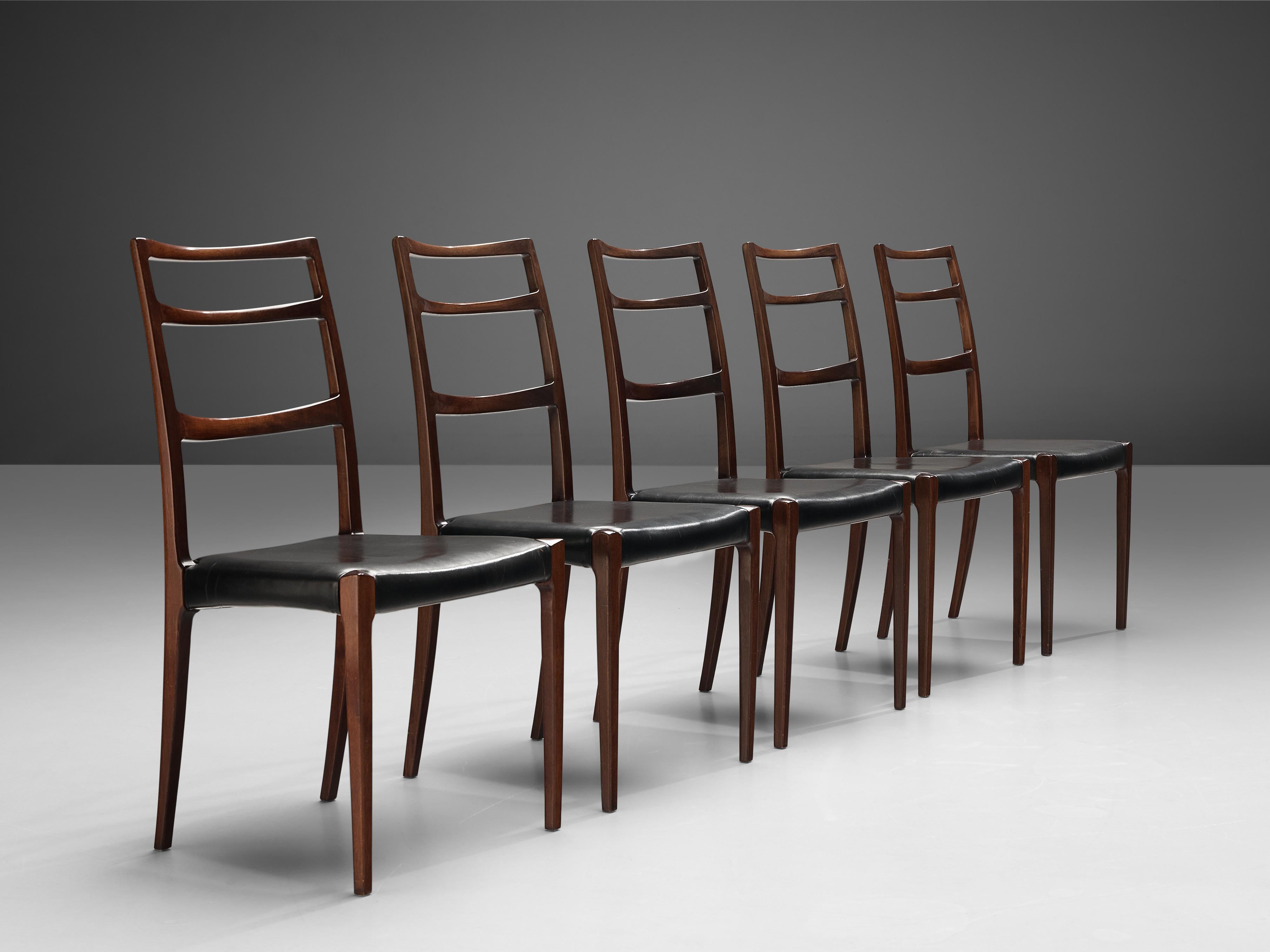 Gunni Omann for Omann Jun, set of five dining chairs, leather, mahogany, Denmark, 1960s-1970s.

This set of five elegant dining chairs features a delicate, well-executed frame. The back is slightly curved and tilted and the open back is supported by